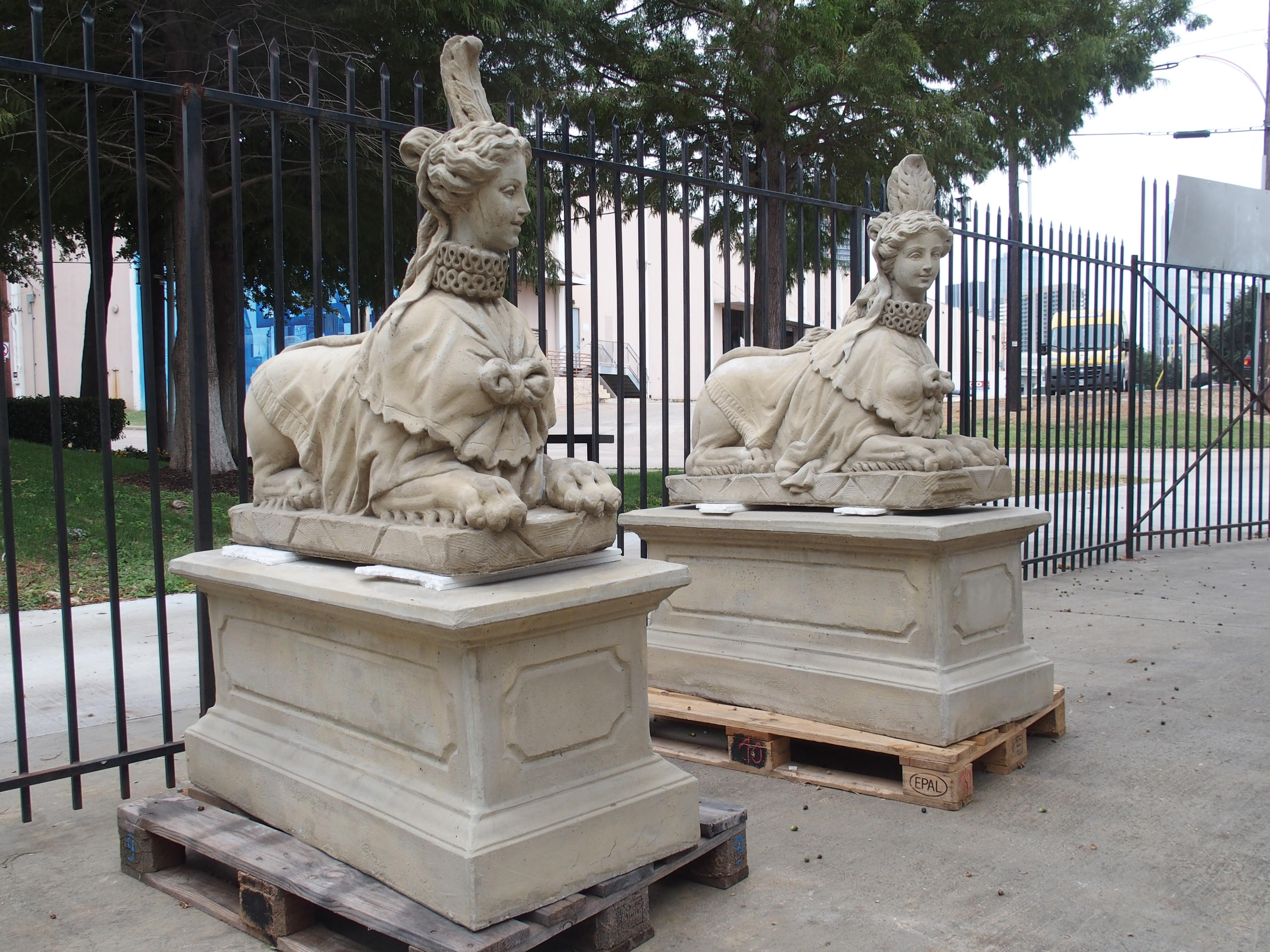 Neoclassical Pair of Large Cast Stone Sphinxes on Pedestal Bases