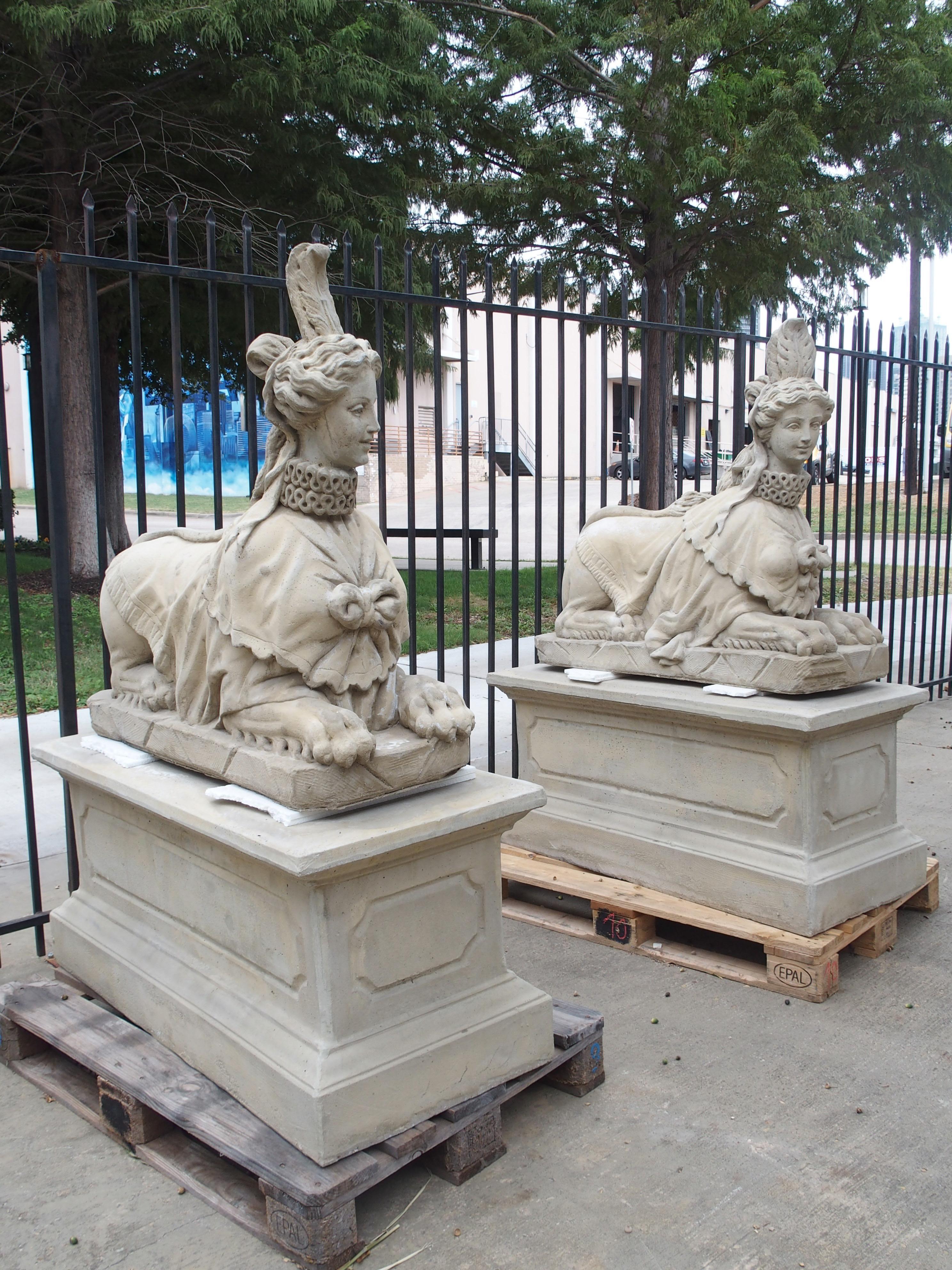 French Pair of Large Cast Stone Sphinxes on Pedestal Bases