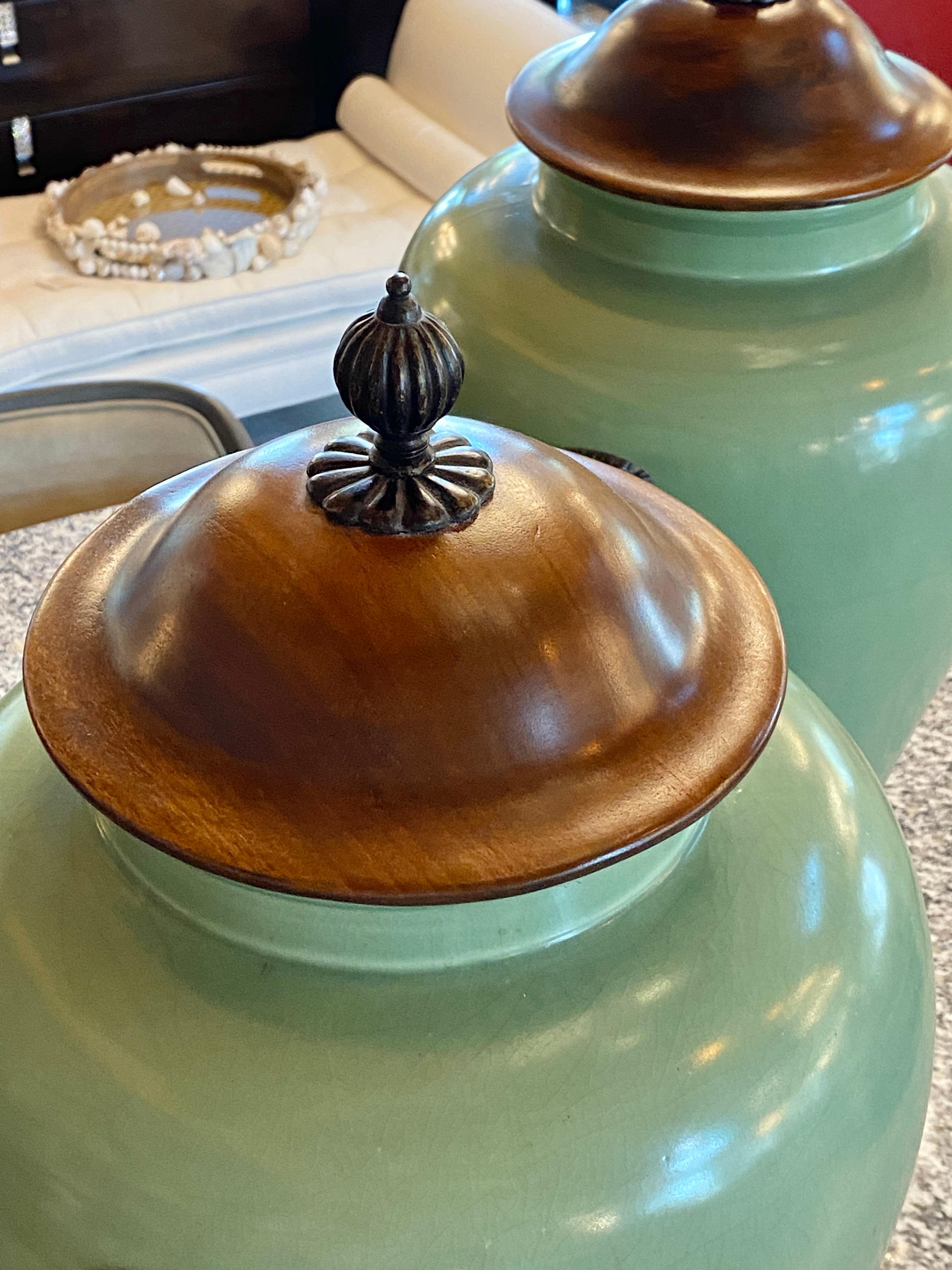 Pair of large Celadon Pottery Urns with Wooden Lids In Good Condition In Bridgehampton, NY
