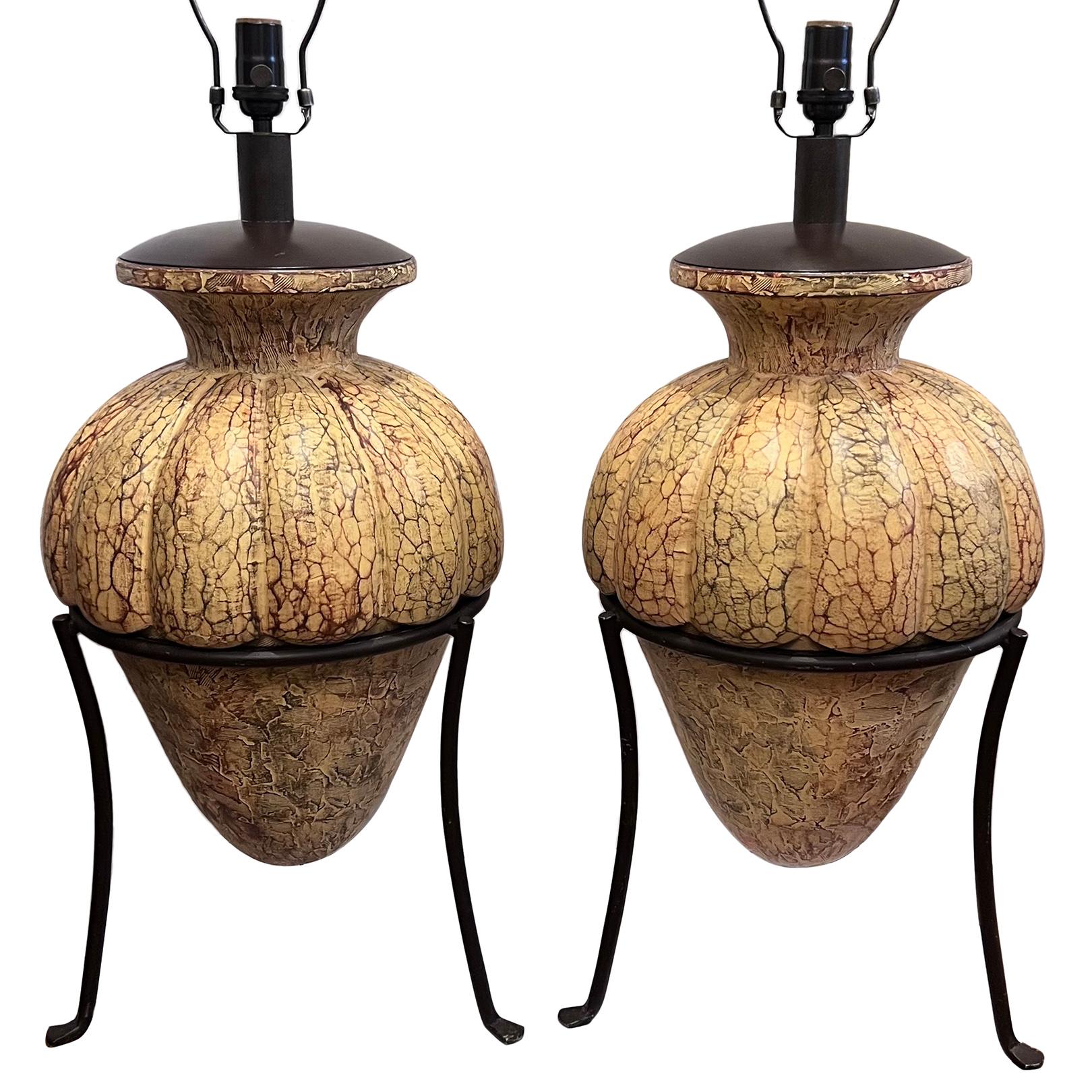 Pair of circa 1950's Italian ceramic lamps with iron bases.

Measurements:
Height of body: 25.5