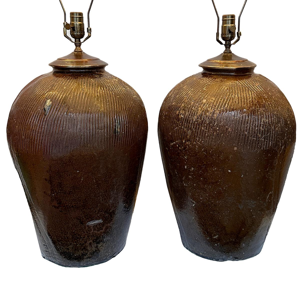Pair of 1960's Italian ceramic lamps.

Measurements:
Height of body: 21