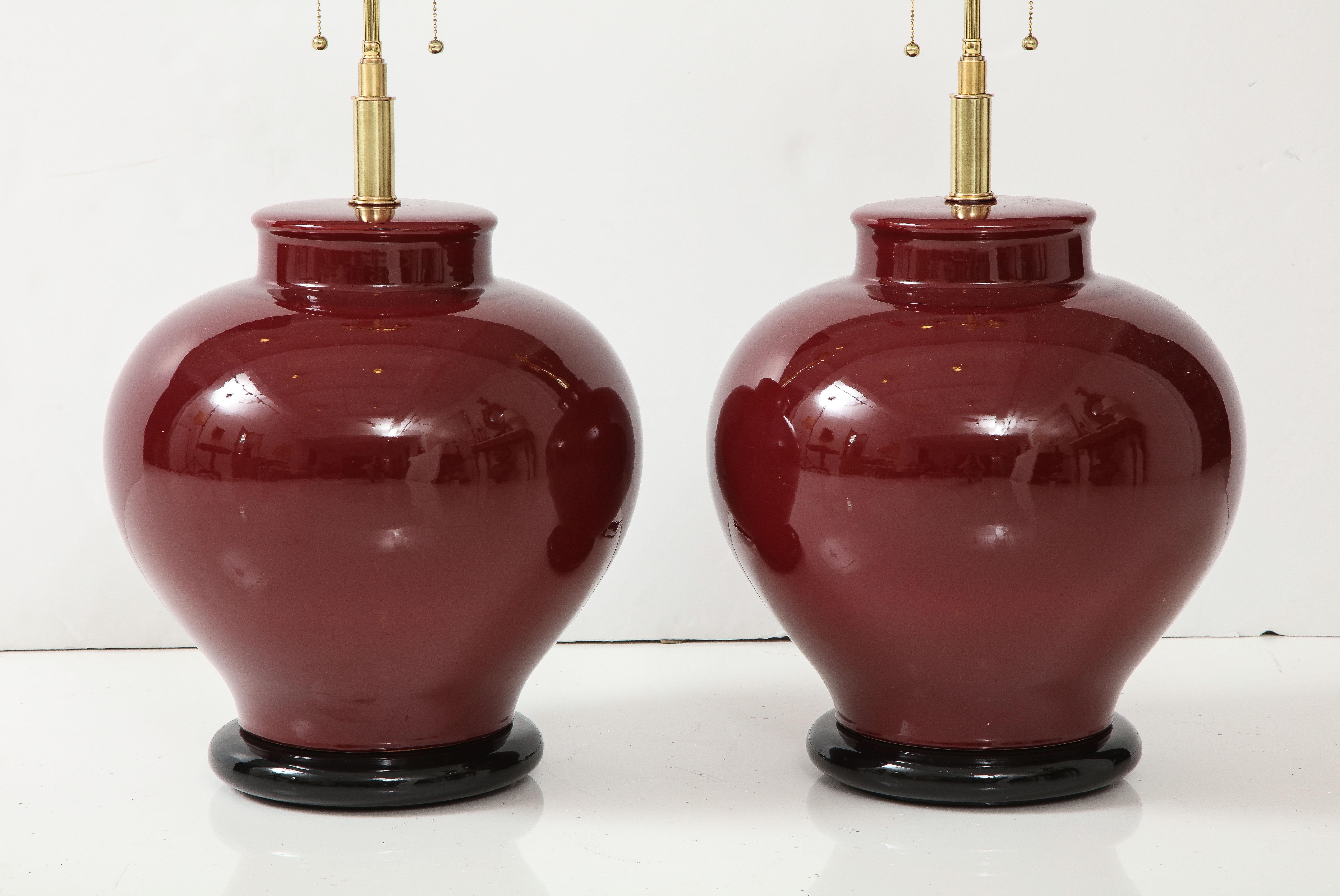 Mid-Century Modern Pair of Large Ceramic Lamps with a Rich Burgundy Glaze Finish For Sale