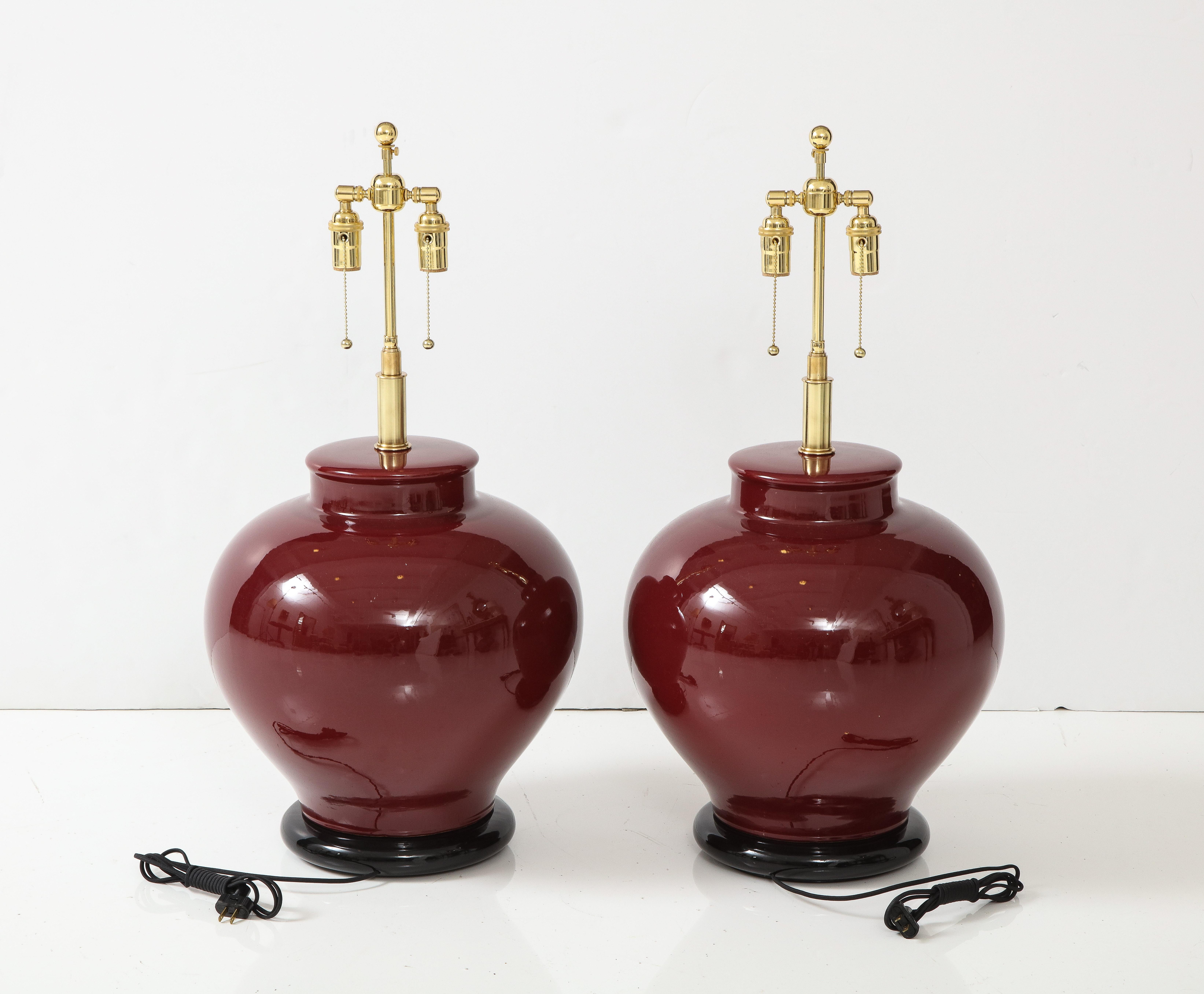 Pair of Large Ceramic Lamps with a Rich Burgundy Glaze Finish For Sale 1