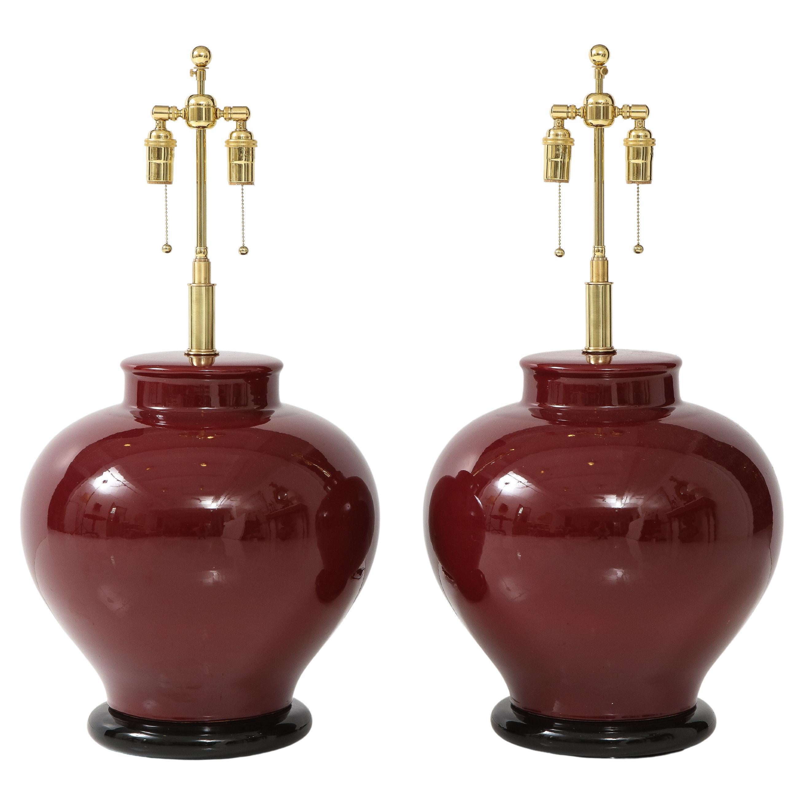 Pair of Large Ceramic Lamps with a Rich Burgundy Glaze Finish For Sale