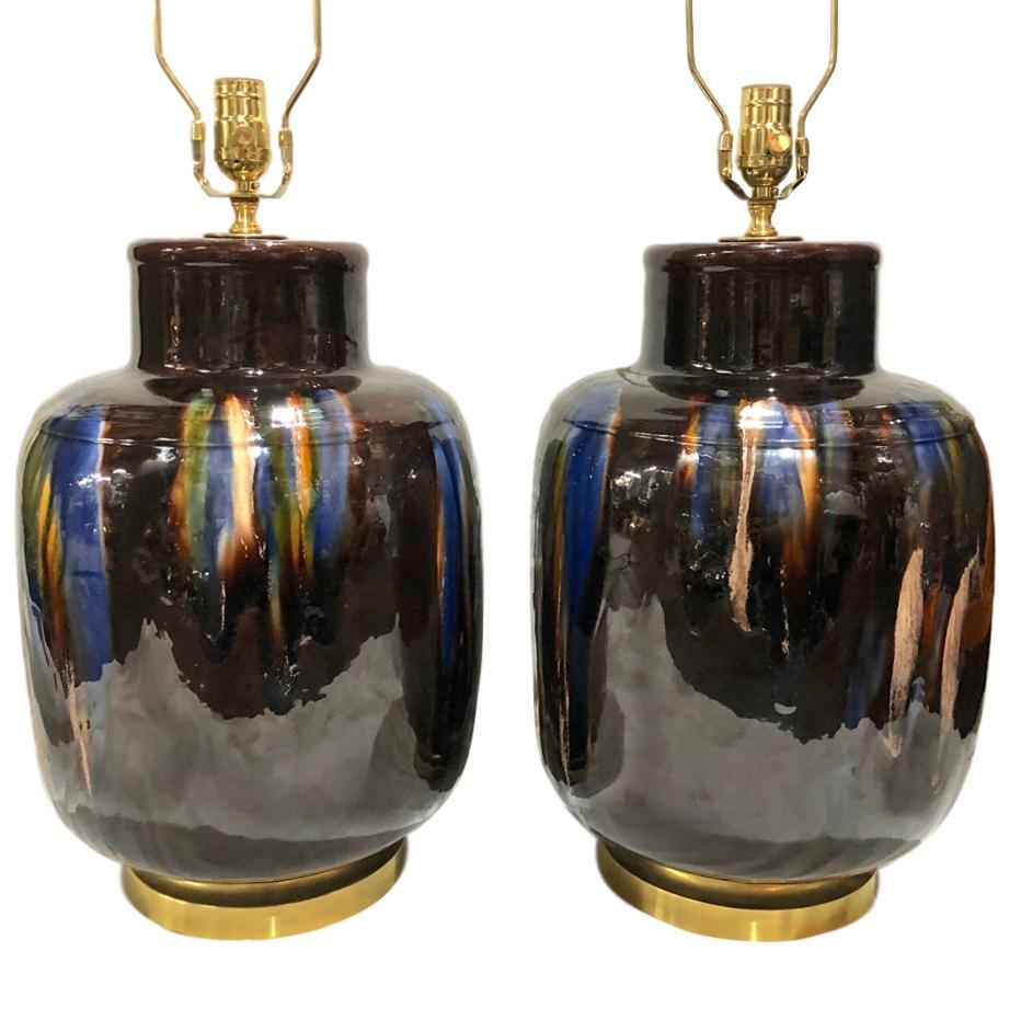 A pair of circa 1960s Italian glazed ceramic table lamps.

Measurements:
Height of body: 17.5