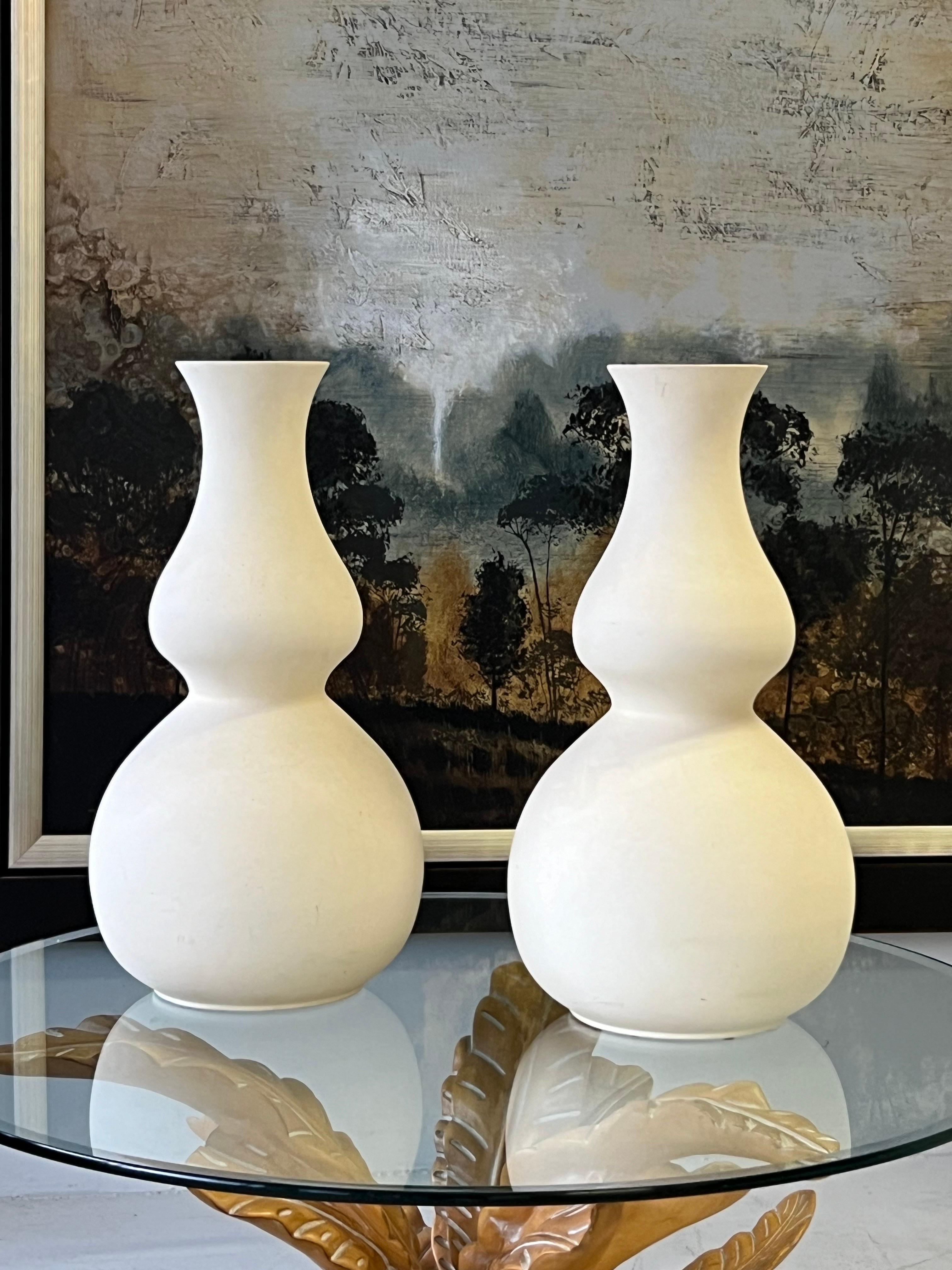 A pair of large ceramic vases. 