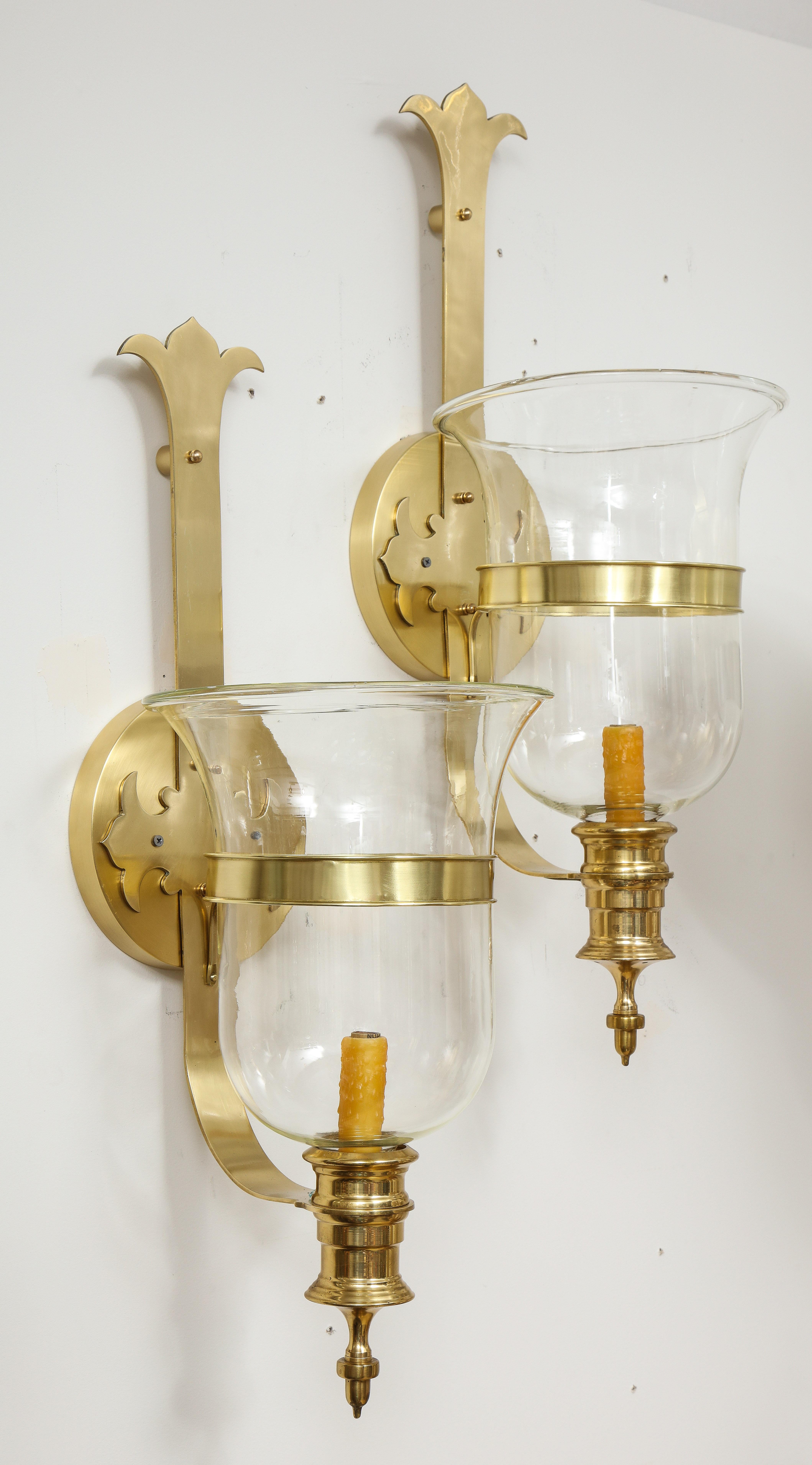 Pair of 1970s Large Hurricane glass sconces.
The polished brass sconces have been Newly rewired and take a Candelabra light bulb 
with a 60 Watt Maximum.