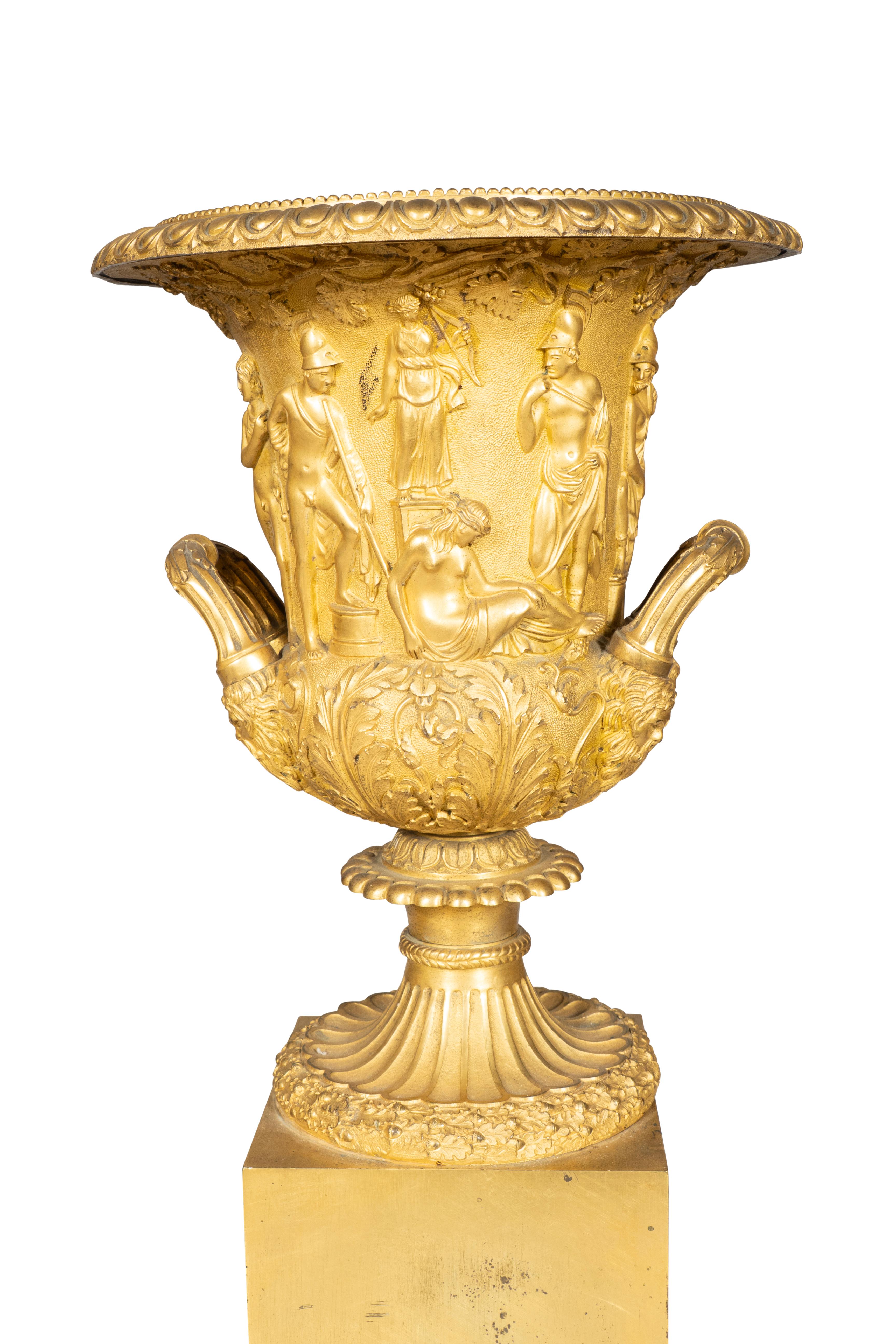 Large size campagna form of the Medici vase with a mythological scene. Two handles. Square plinth base.