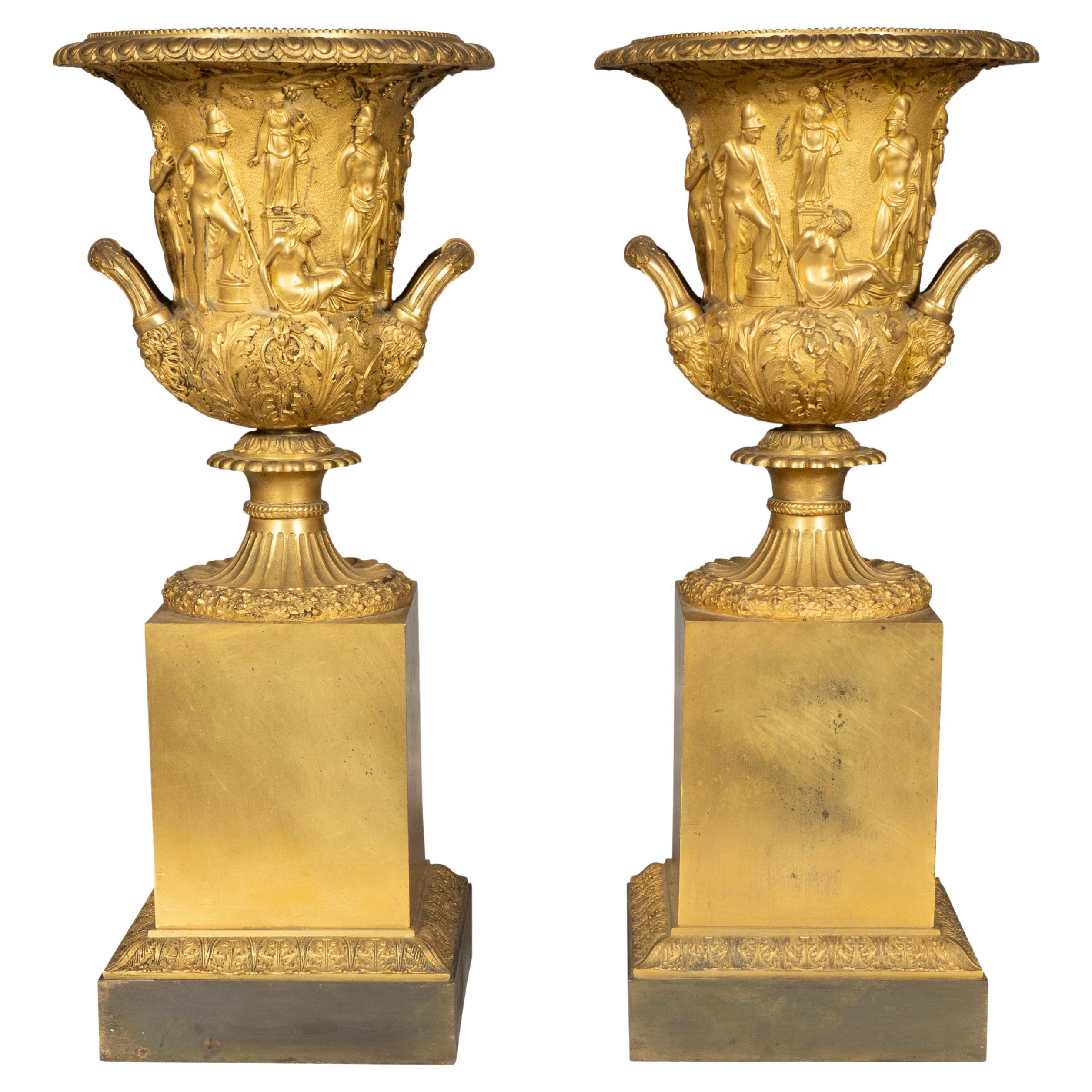 Pair Of Large Charles X Gilt Bronze Urns For Sale