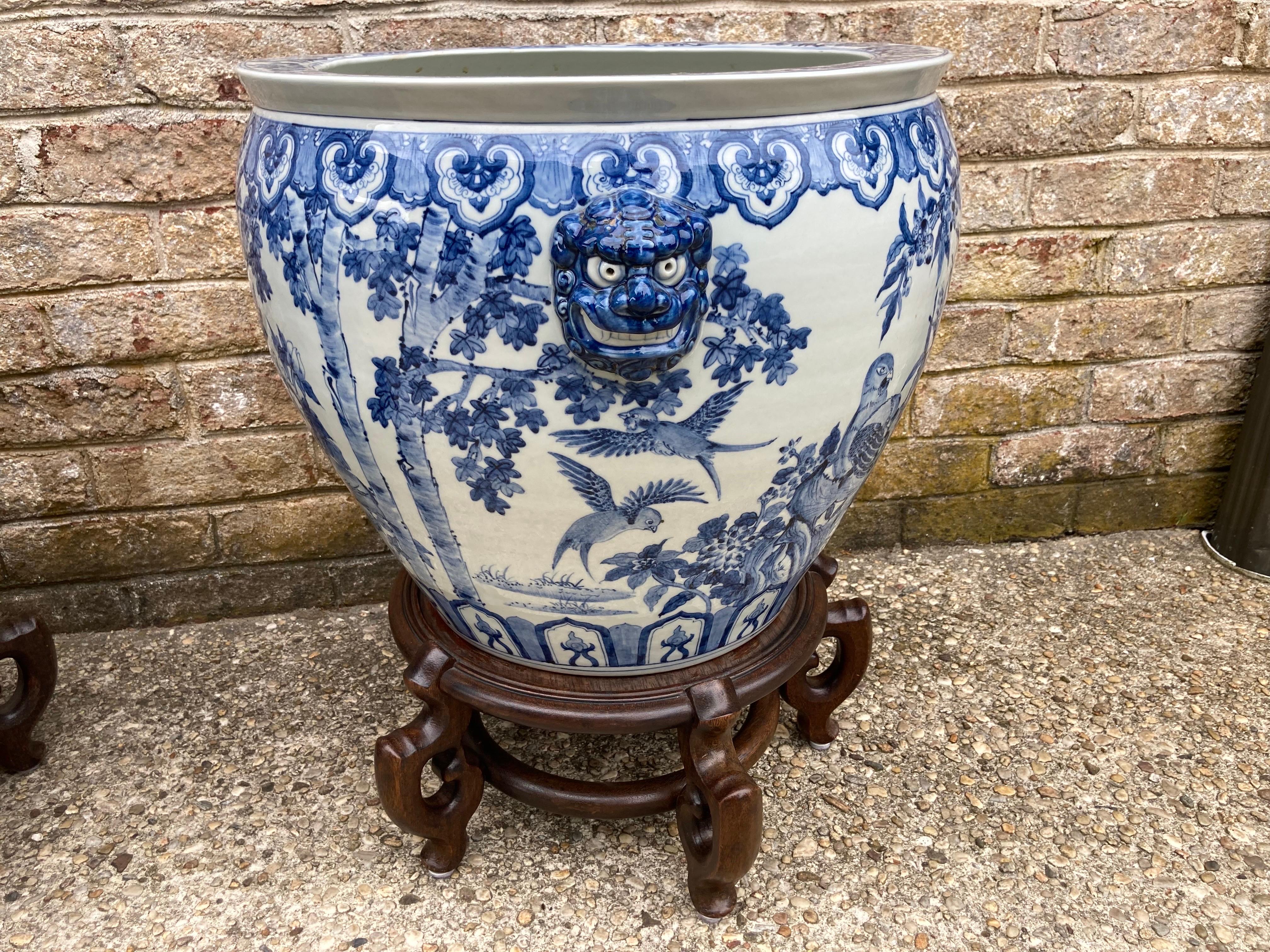 20th Century Pair of Large Chinese Blue and White Planters on Stands