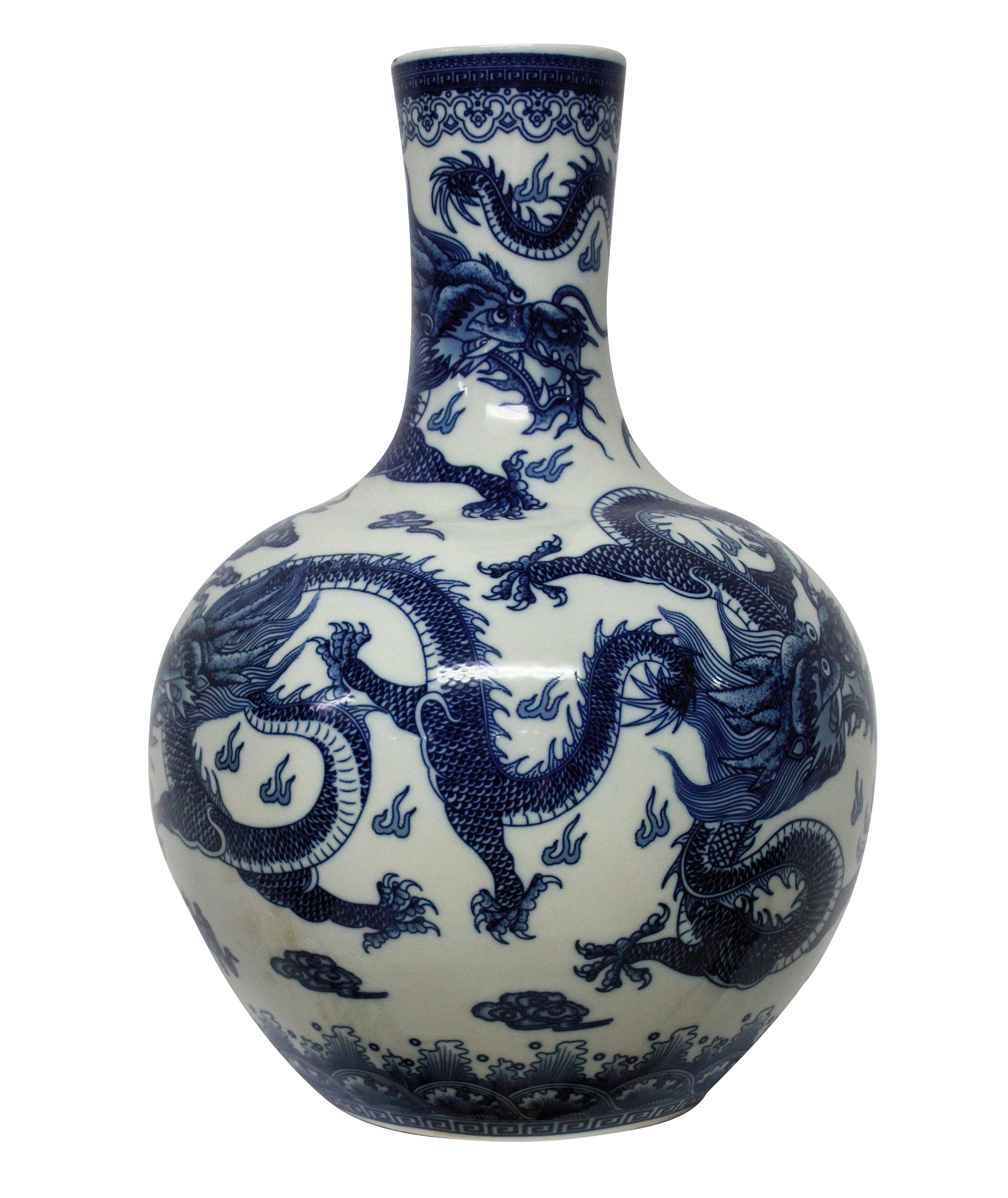 A pair of large Chinese blue and white glazed vases, depicting dragons.