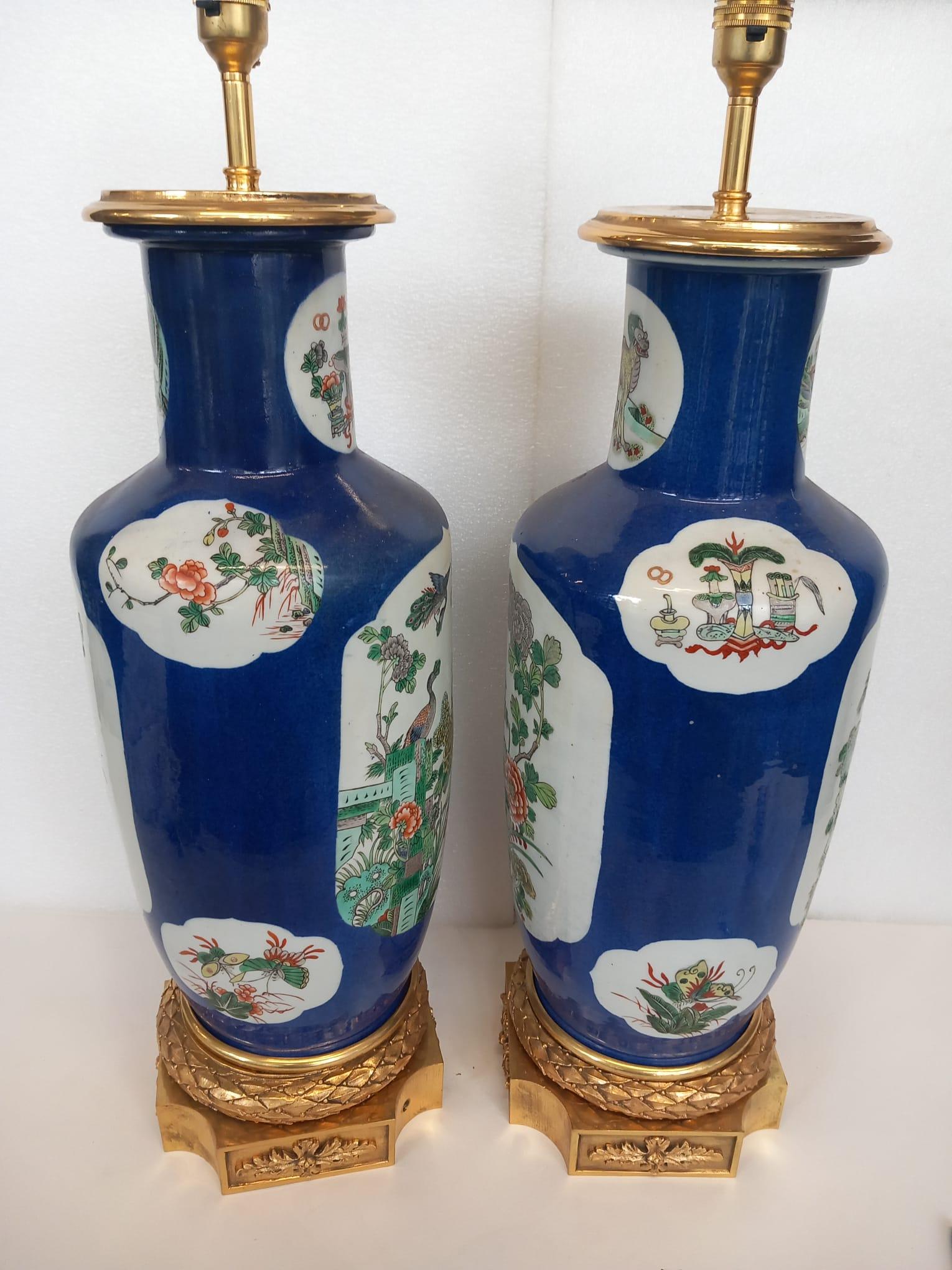 Gilt Pair of large Chinese blue vases , converted into lamps  For Sale