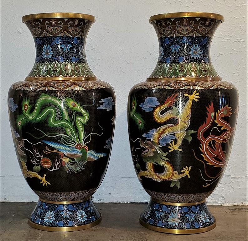 Presenting a gorgeous pair of large Chinese bronze cloisonne dragon and phoenix vases.

Mid-late 20th century, circa 1970.

Made by the JINGFA Beijing Cloisonné Factory and has it’s original red label marked ‘JINGFA’ on one and ‘Made in China’