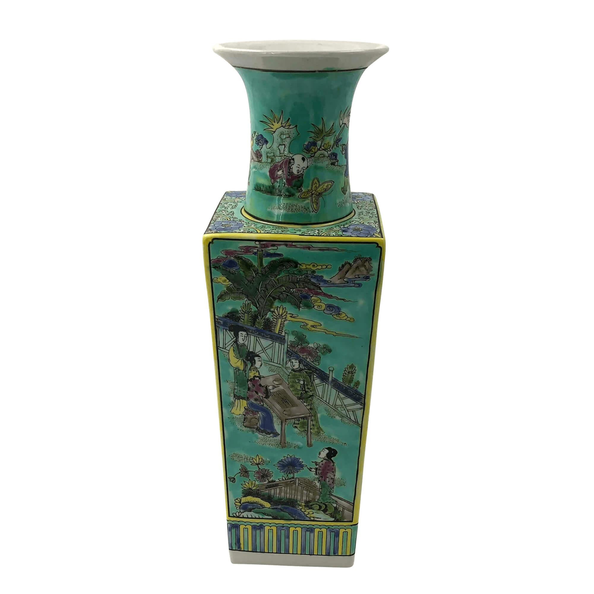 Tall Chinese Famille rose squared tapered flower vases decorated with Chinese scenes.

Dimensions: 6.25