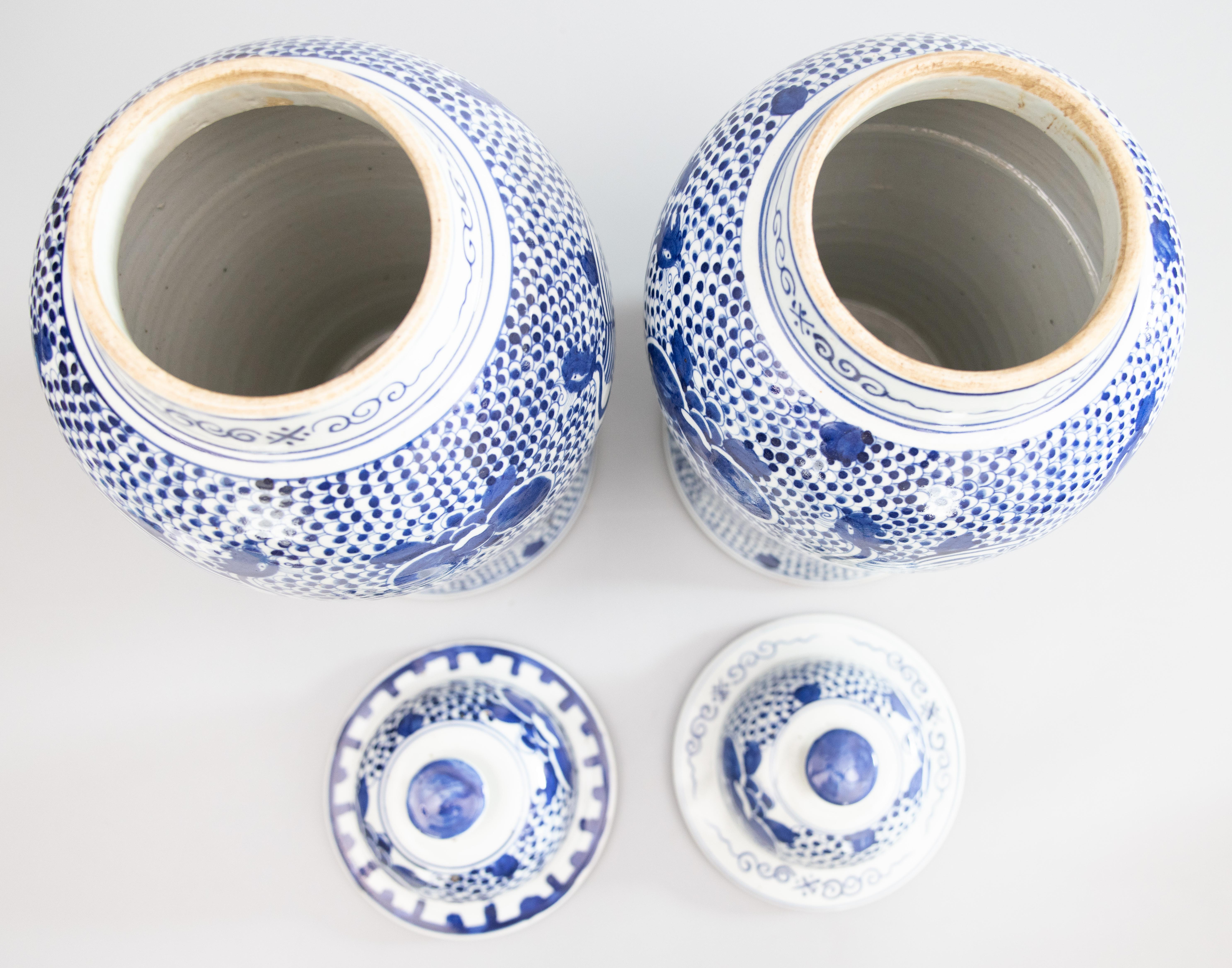 Ceramic Pair of Large Chinese Phoenix and Peony Blue and White Temple Jars Ginger Jars For Sale