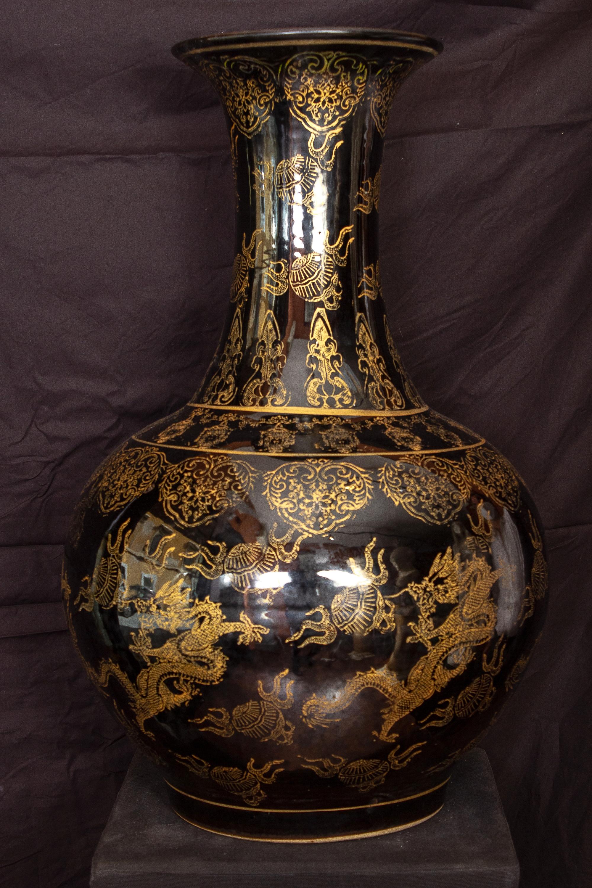 Pair of Large Chinese Porcelain Black and Gilt-Decorated Vases 1
