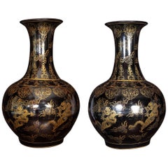 Pair of Large Chinese Porcelain Black and Gilt-Decorated Vases