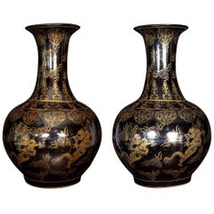 Pair of Large Chinese Porcelain Black and Gilt-Decorated Vases