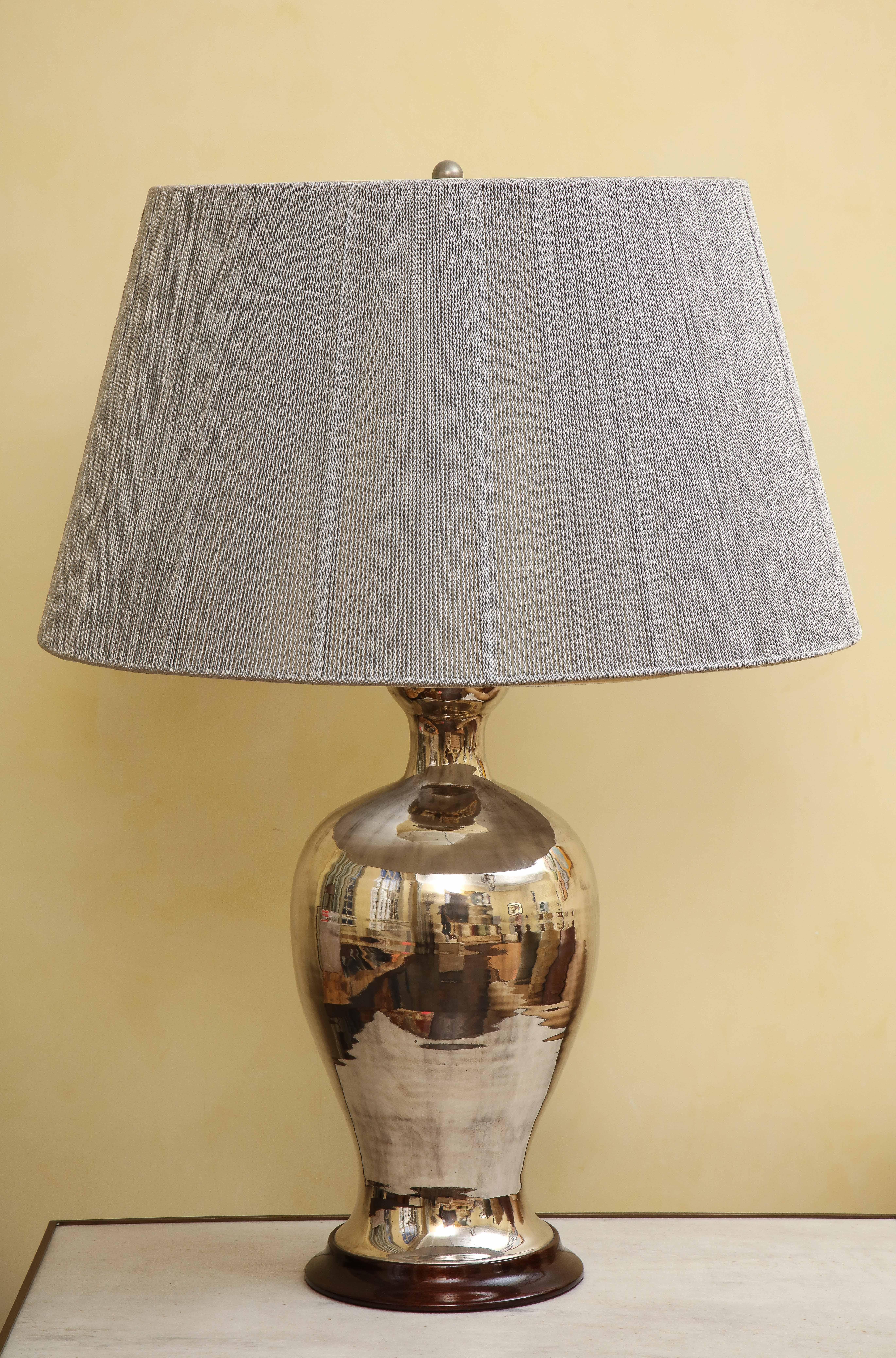 large silver lamps