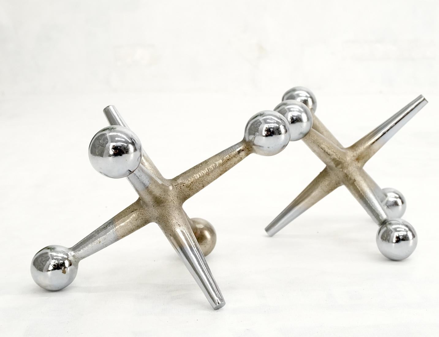 Polished Pair of Large Chrome Jacks Book Ends For Sale