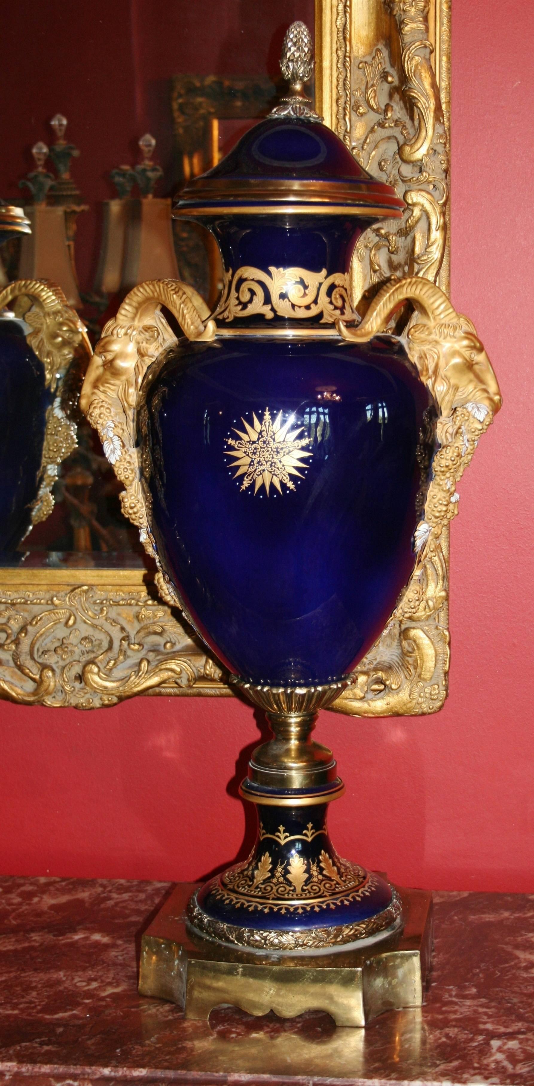 Pair of Large Cobalt Blue Lidded Urns with Gilt Rams Head Handles For Sale 1