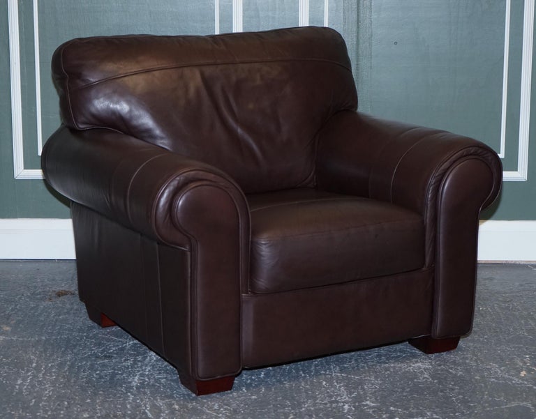 PAIR OF LARGE COMFORTABLE BROWN LEATHER ARMCHAIRS, MATCHiNG SOFA