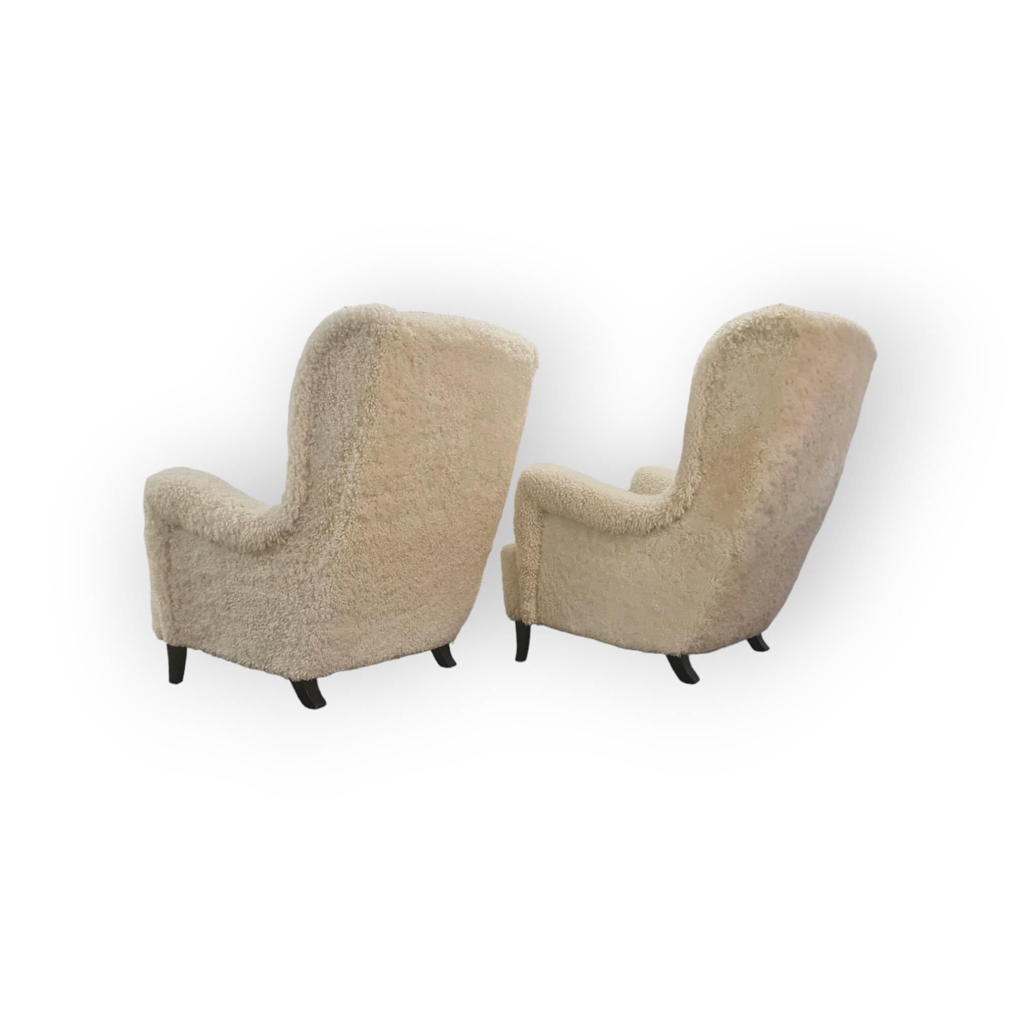 Mid-20th Century Pair of Large & Comfortable Finnish Highback Armchairs in White Sheepskin For Sale