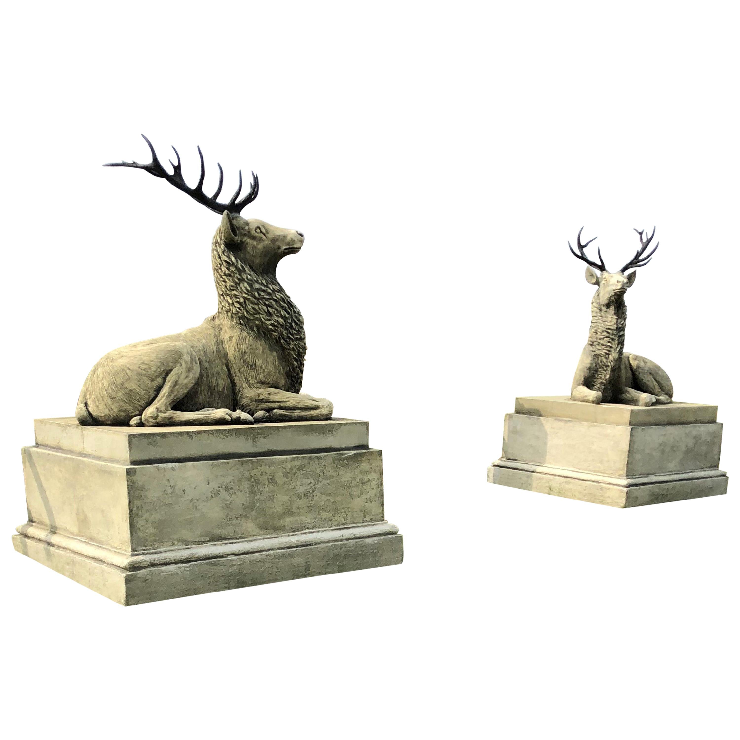 Pair of Large Composite Stone Recumbent Stags on Plinths, 21st Century