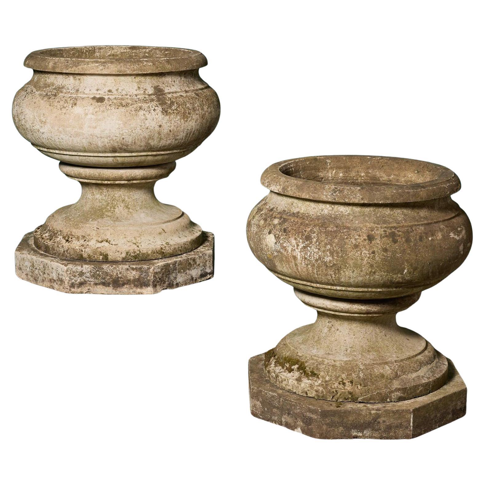 Pair of Large Composition Stone Urns For Sale