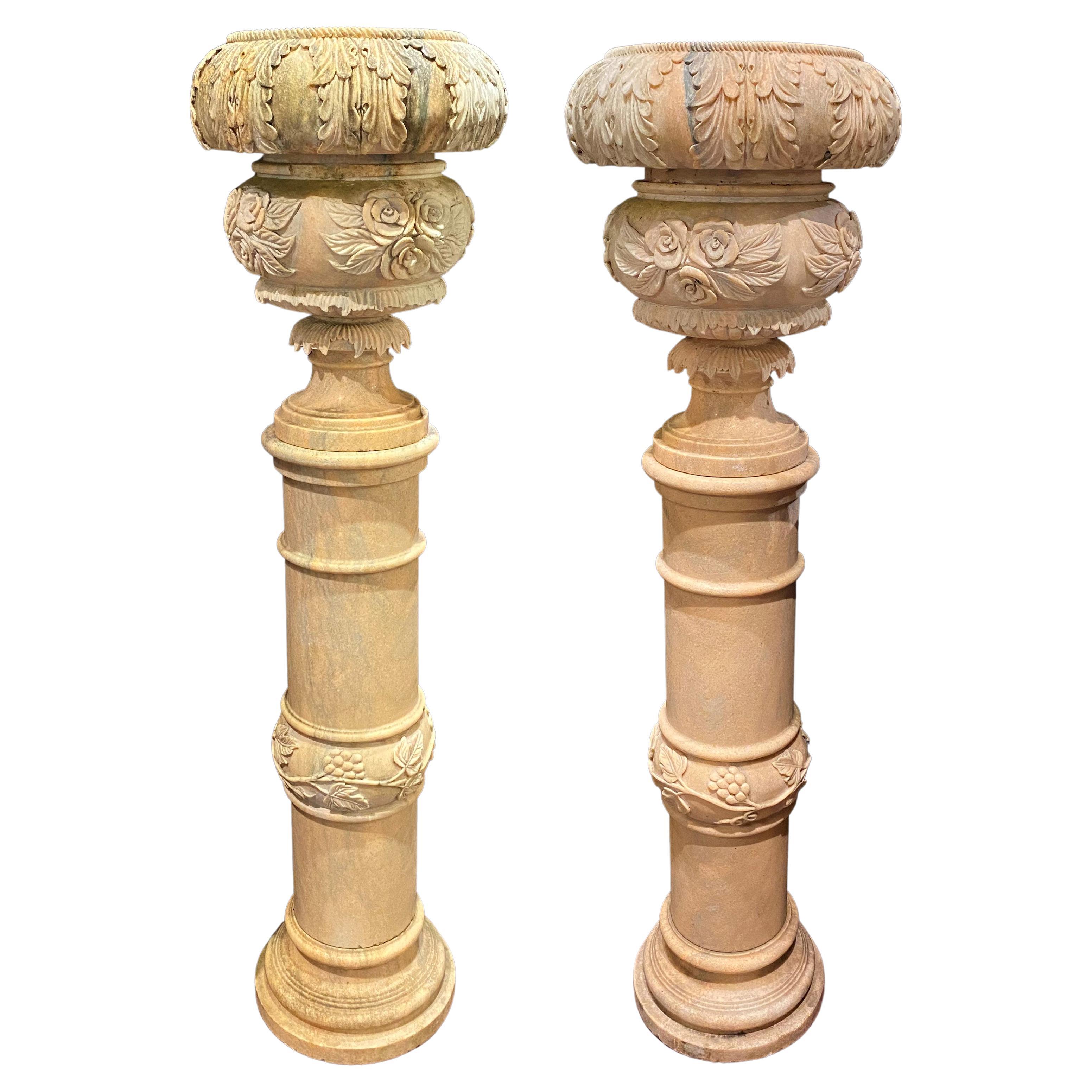 Pair of Large Continental Style Marble Carved Urns on Pedestals For Sale