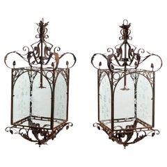 A Pair of Early 20th Century American Wrought Iron Lanterns A Pair of Early 20th Century American Wrought Iron Lanterns