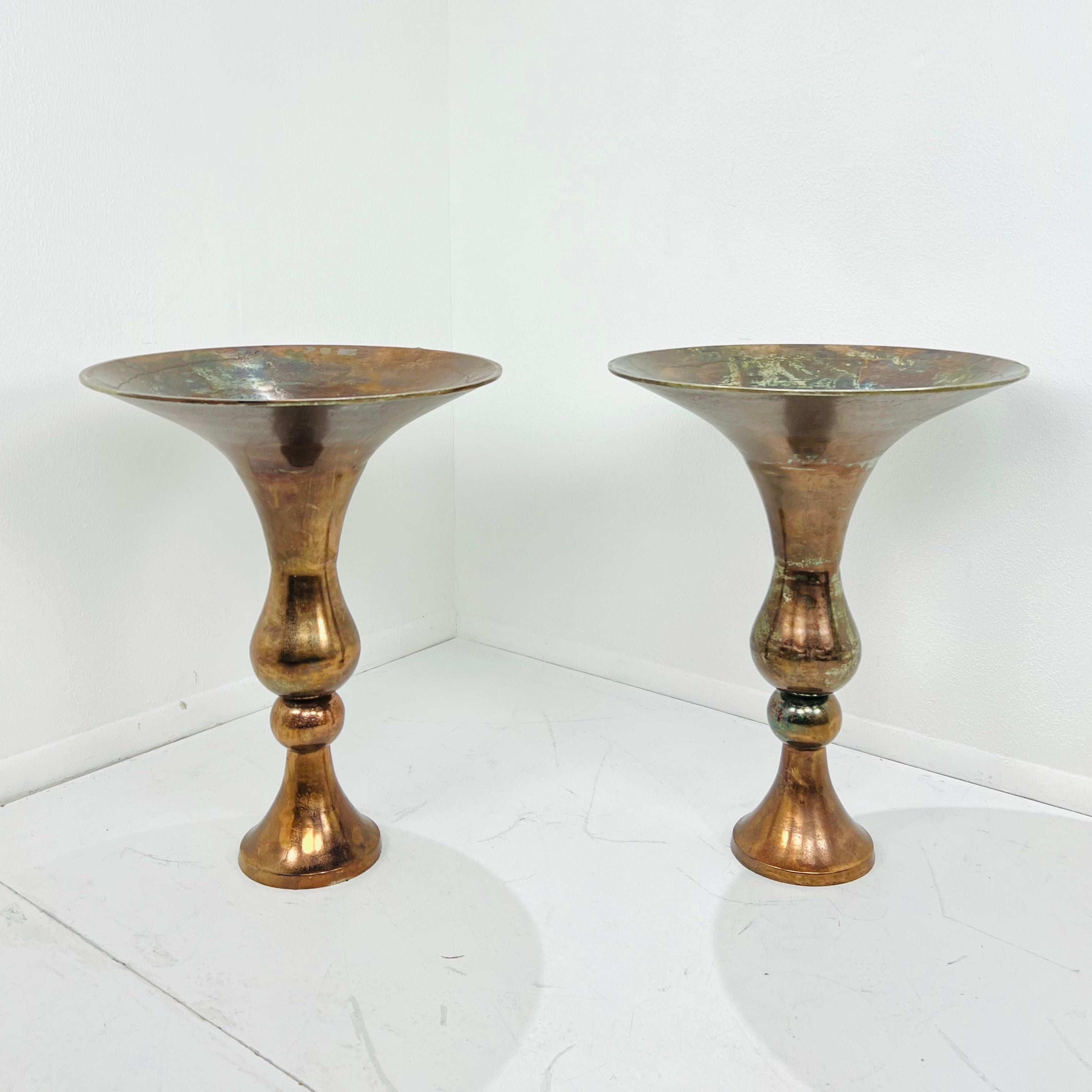 Pair of oversized copper finish floor vases. Good vintage condition with some imperfections to copper finish due to age and use. 
30.75