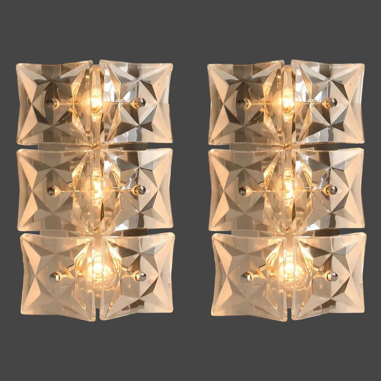 Elegant pair of stunning large wall lights with crystal glass panels. Each made of chrome plated metal and glass. Each fixture requires three European E14 light bulbs, up to 40 watts each. A nice addition to any room. Lightbulbs shown in the