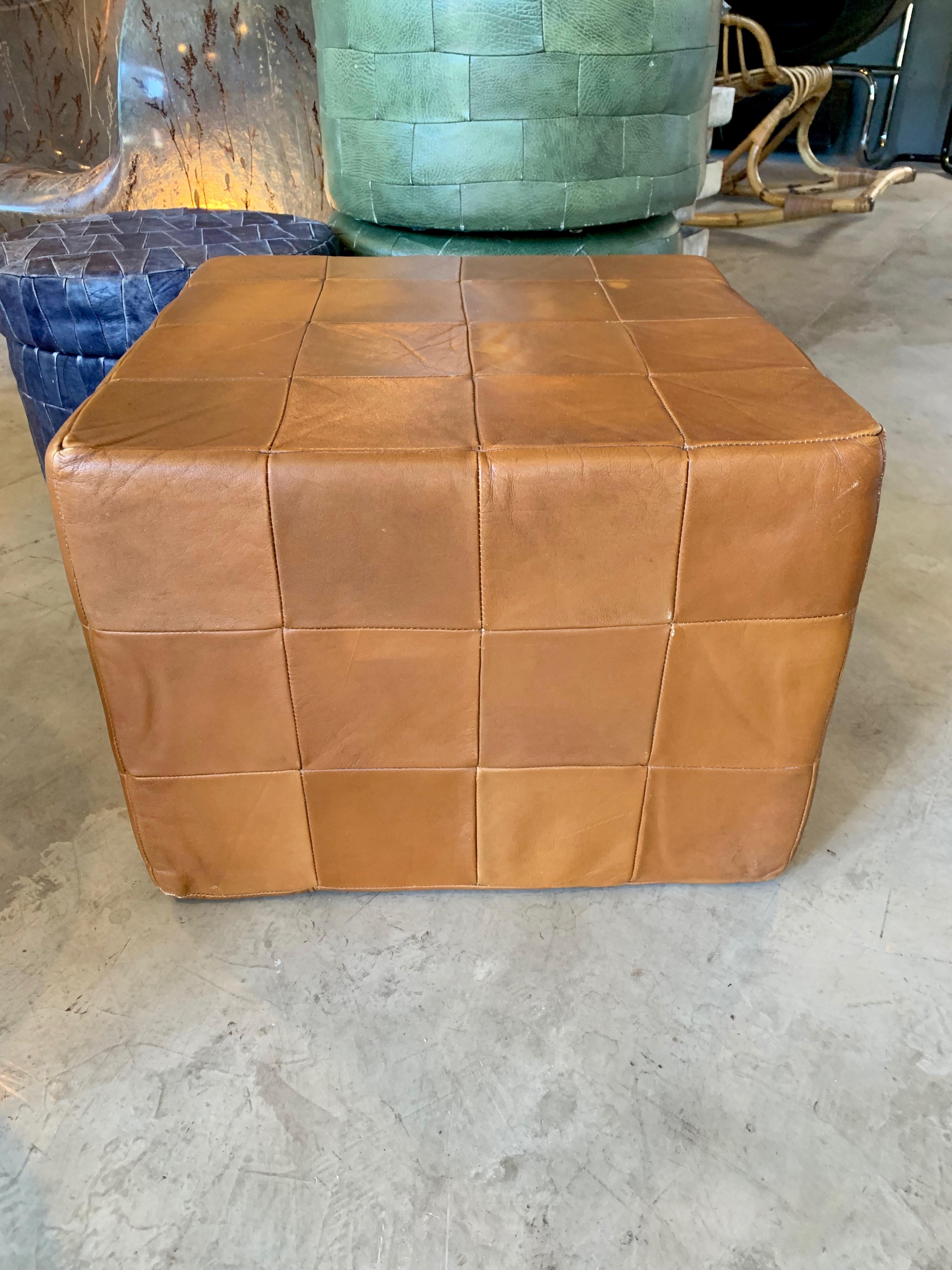 Pair of large patchwork leather ottomans by De Sede in camel. Patchwork leather with great coloring and patina to leather. Very good condition. Great accent piece. 

Priced as a pair.





  