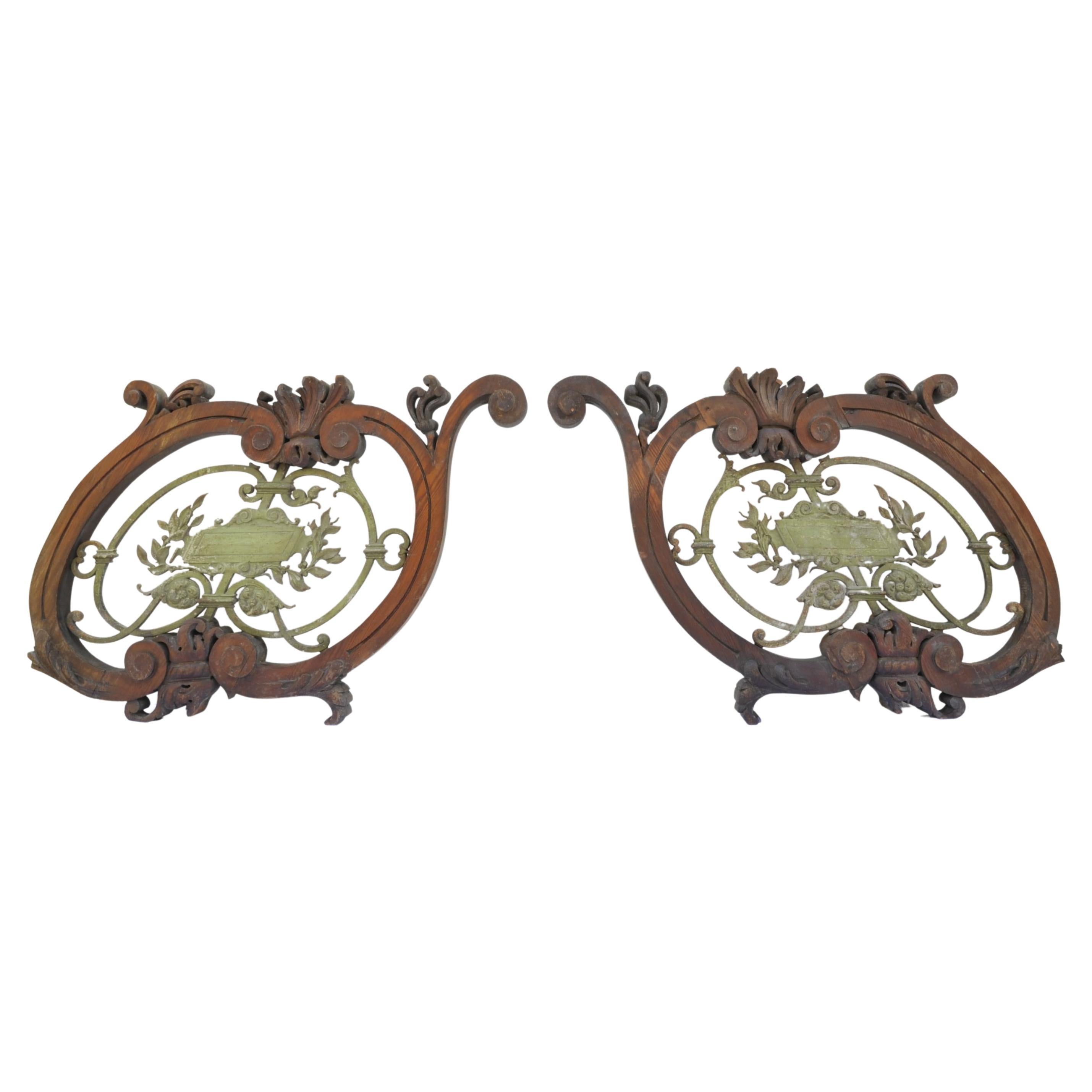 Pair of Large Decorative Elements in Carved Wood and Wrought Iron For Sale