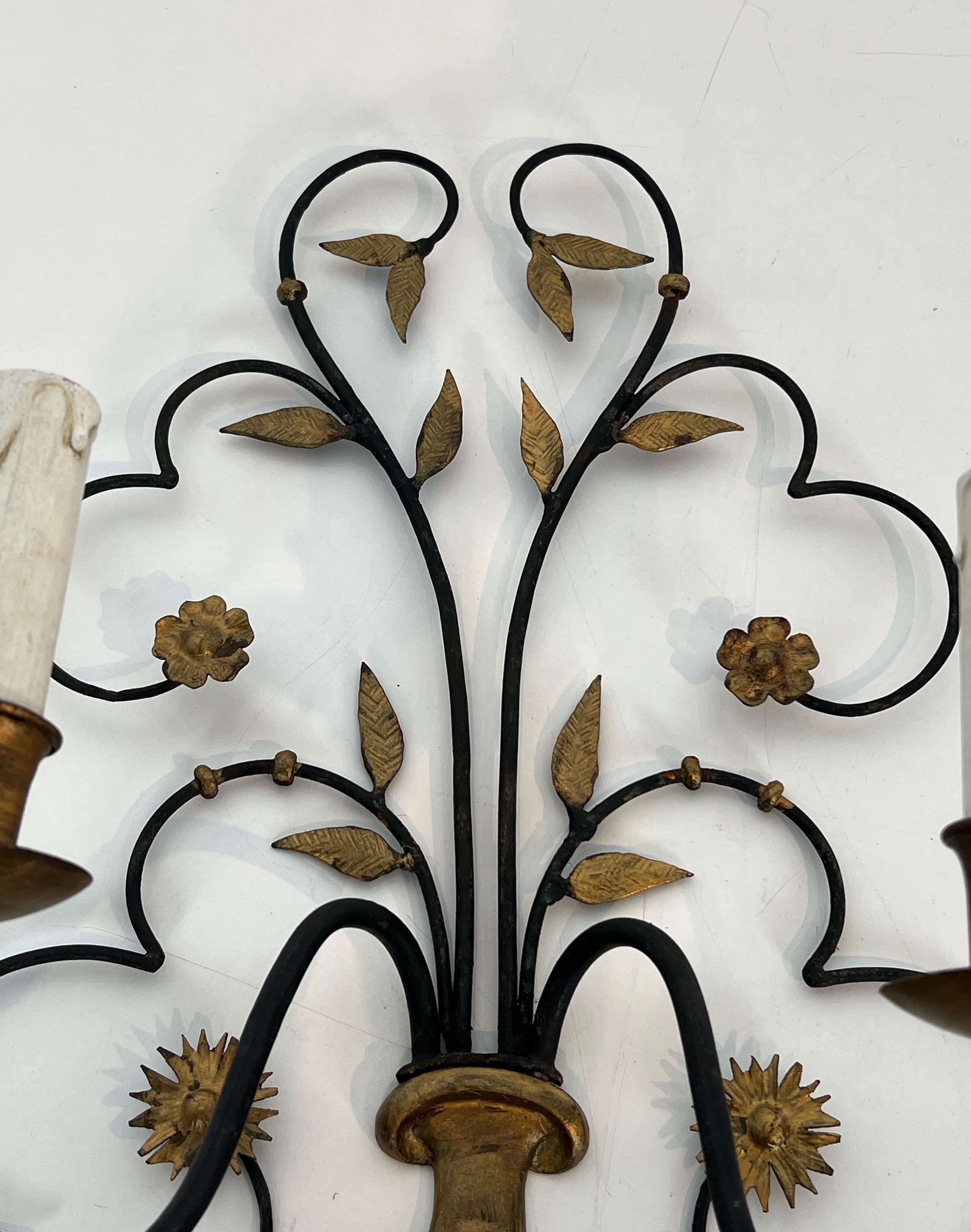Mid-20th Century Pair of Large Decorative Wrought Iron and Gilded Wall Lights Representing a Bouq For Sale