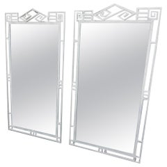 Paire de grands miroirs décoratifs en fer forgé