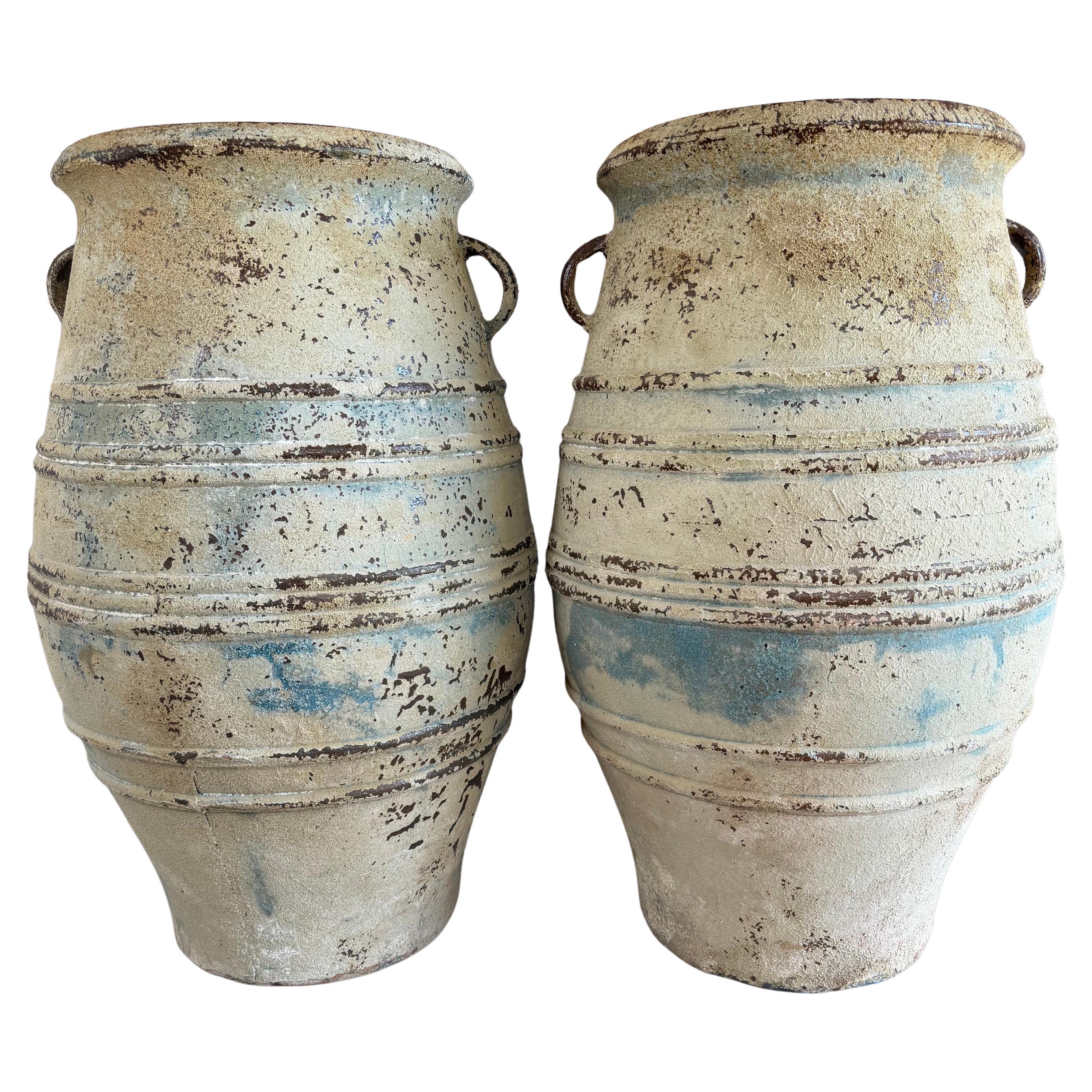 Pair of Large Distressed Mediterranean Style Terracotta Olive Jars with Handles For Sale