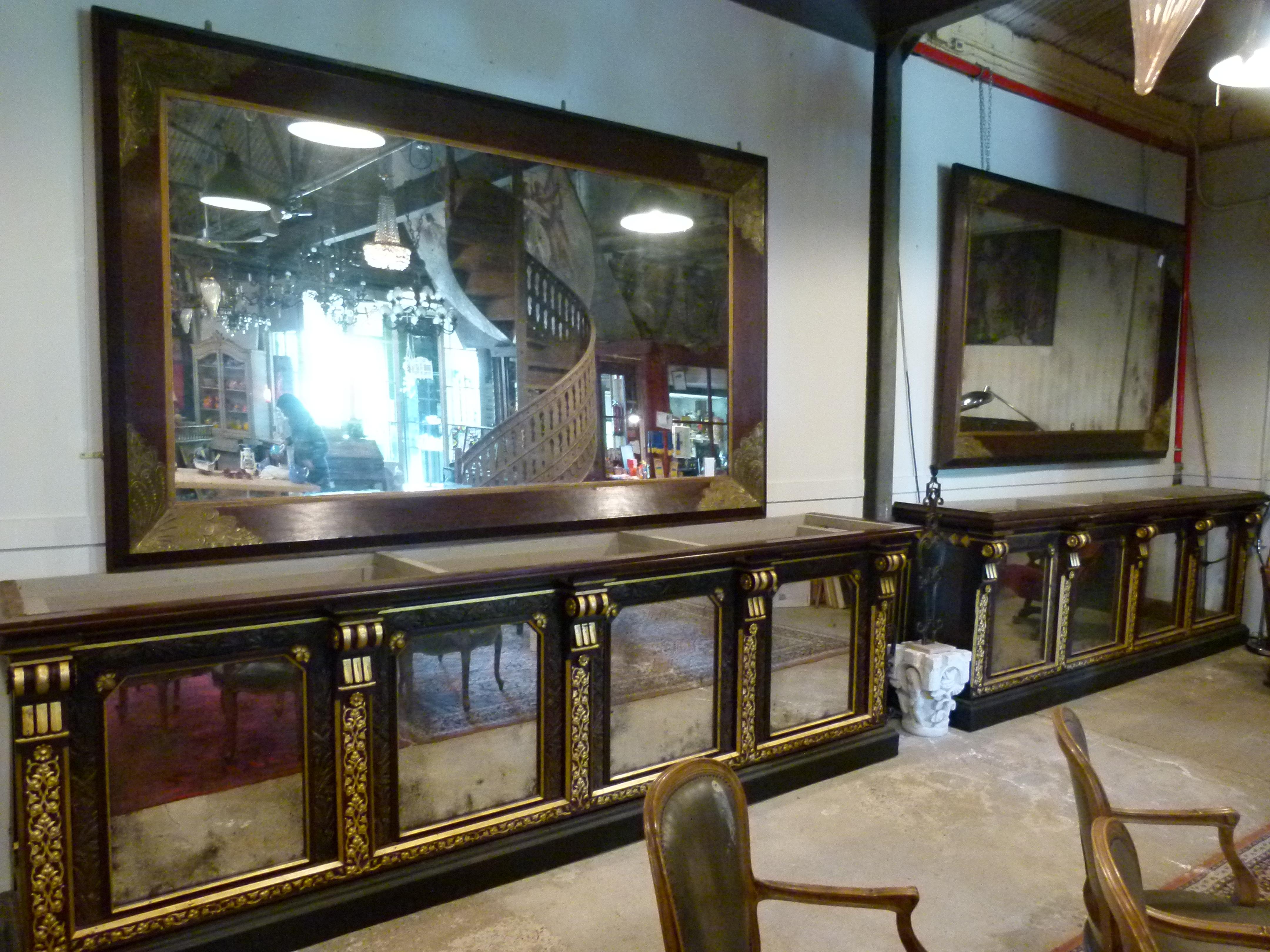 Pair of large early 20th century wall mirrors with wooden frame.
Measurements with frame: 283 x 174 cm.
 
 
 