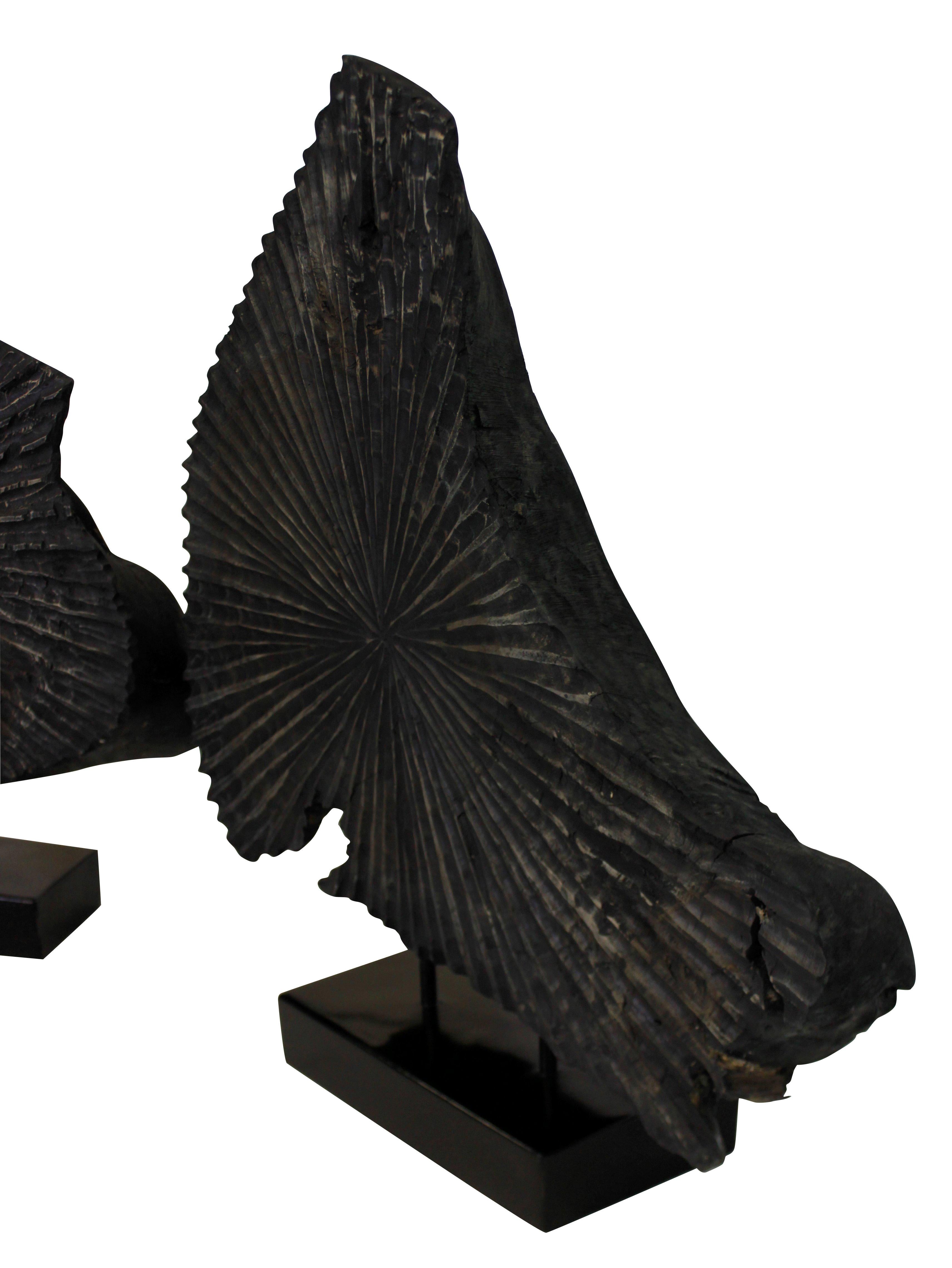 Pair of Large Ebonized Tree Trunk Sculptures 1