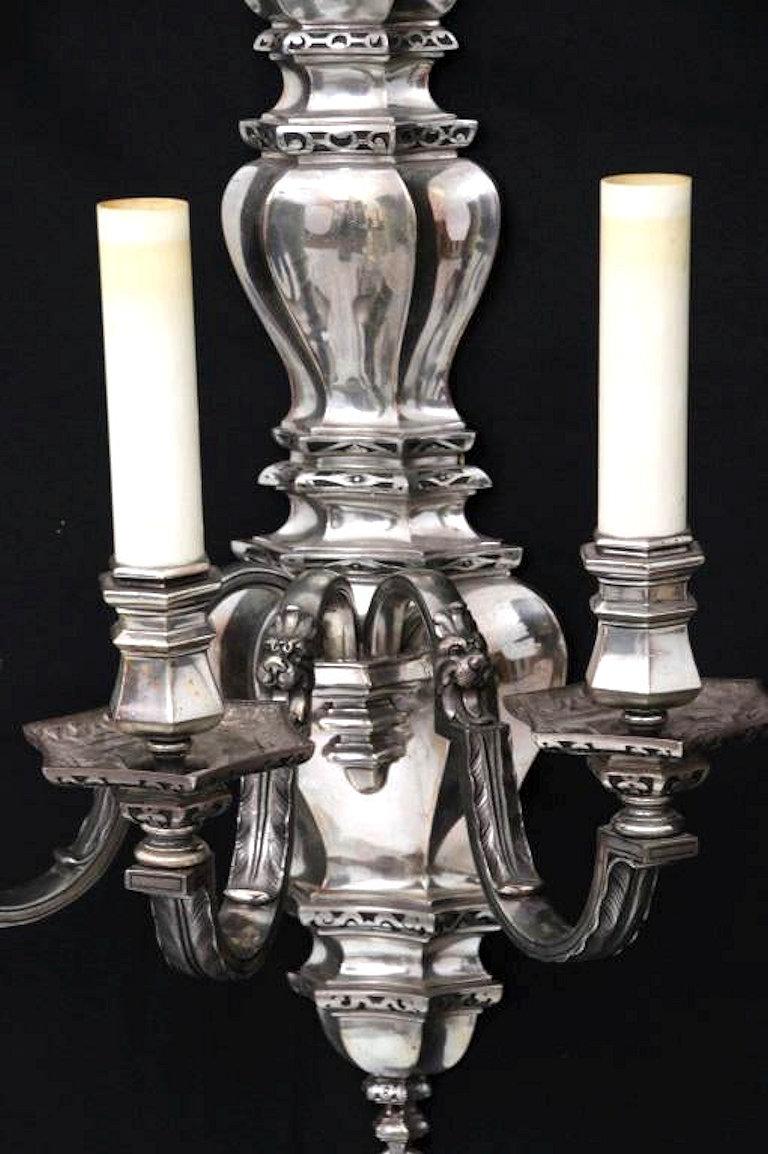 Pair of very large and finest quality E.F. Caldwell silvered metal 3-light sconces.