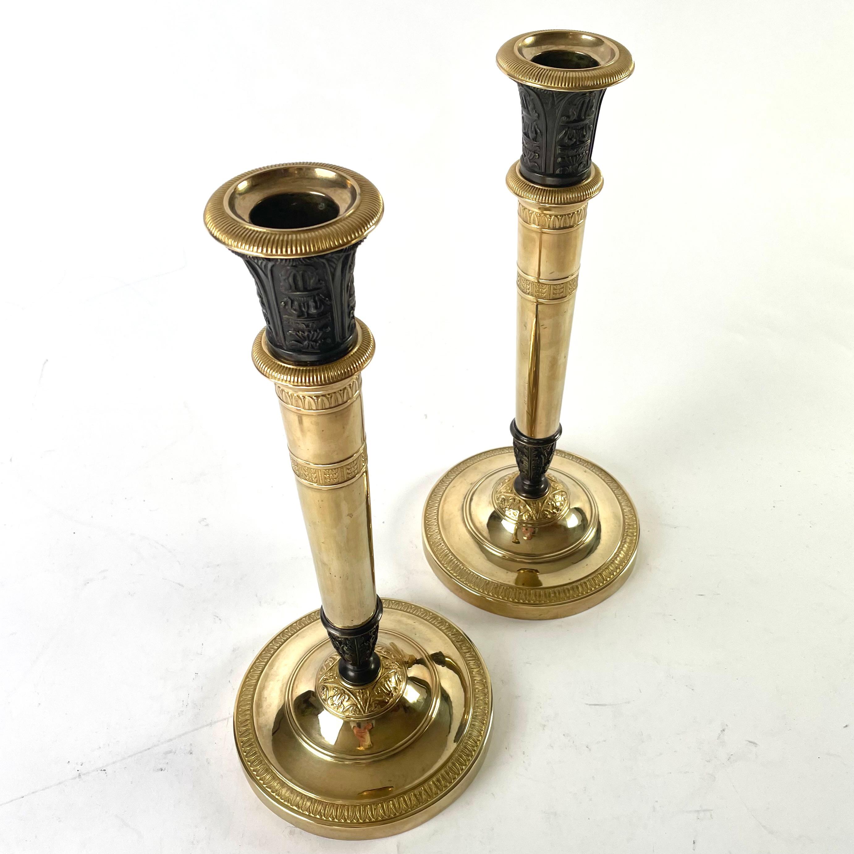 Gilt Pair of large Empire Candlesticks, convertible into Candelabra. France 1820s For Sale