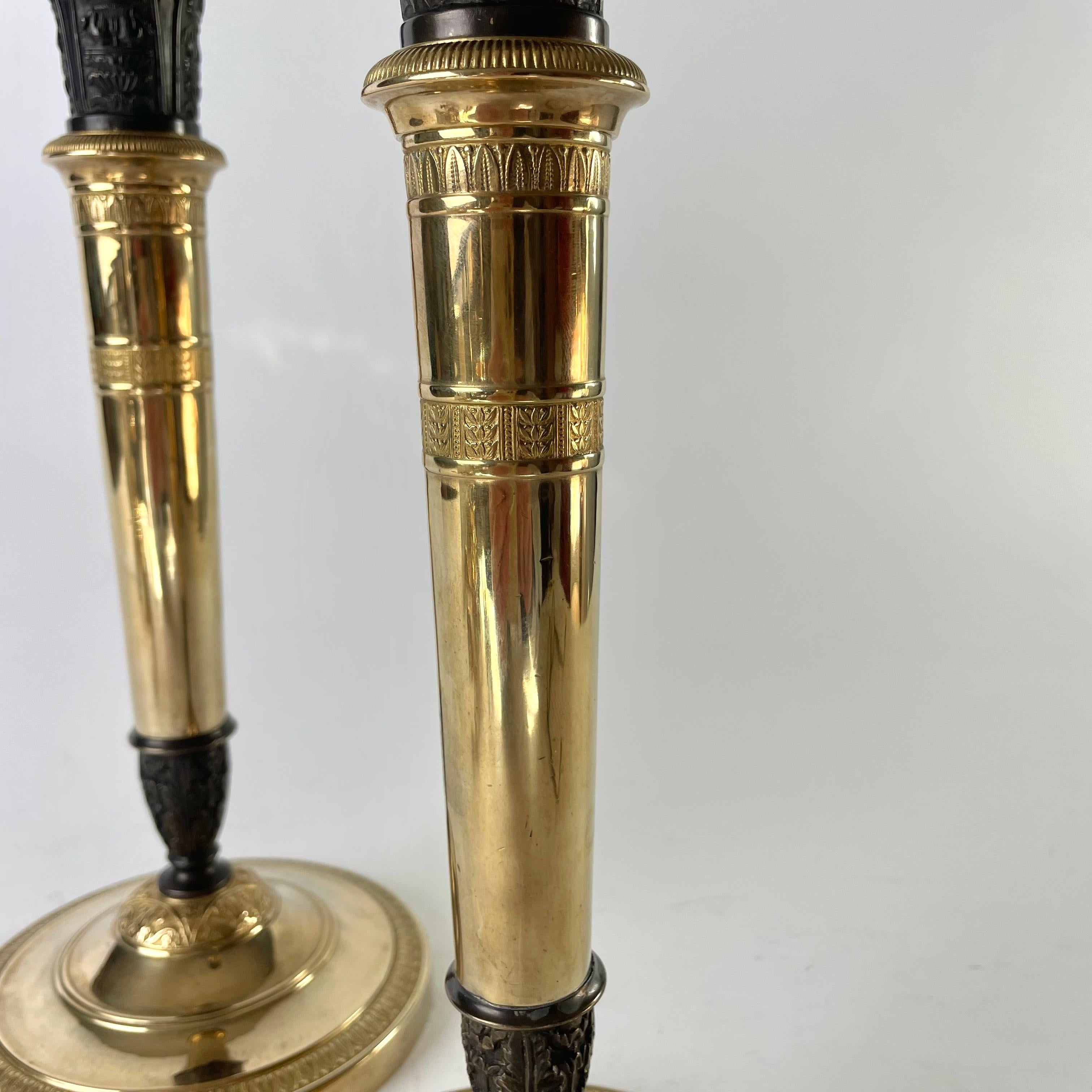 Bronze Pair of large Empire Candlesticks, convertible into Candelabra. France 1820s For Sale
