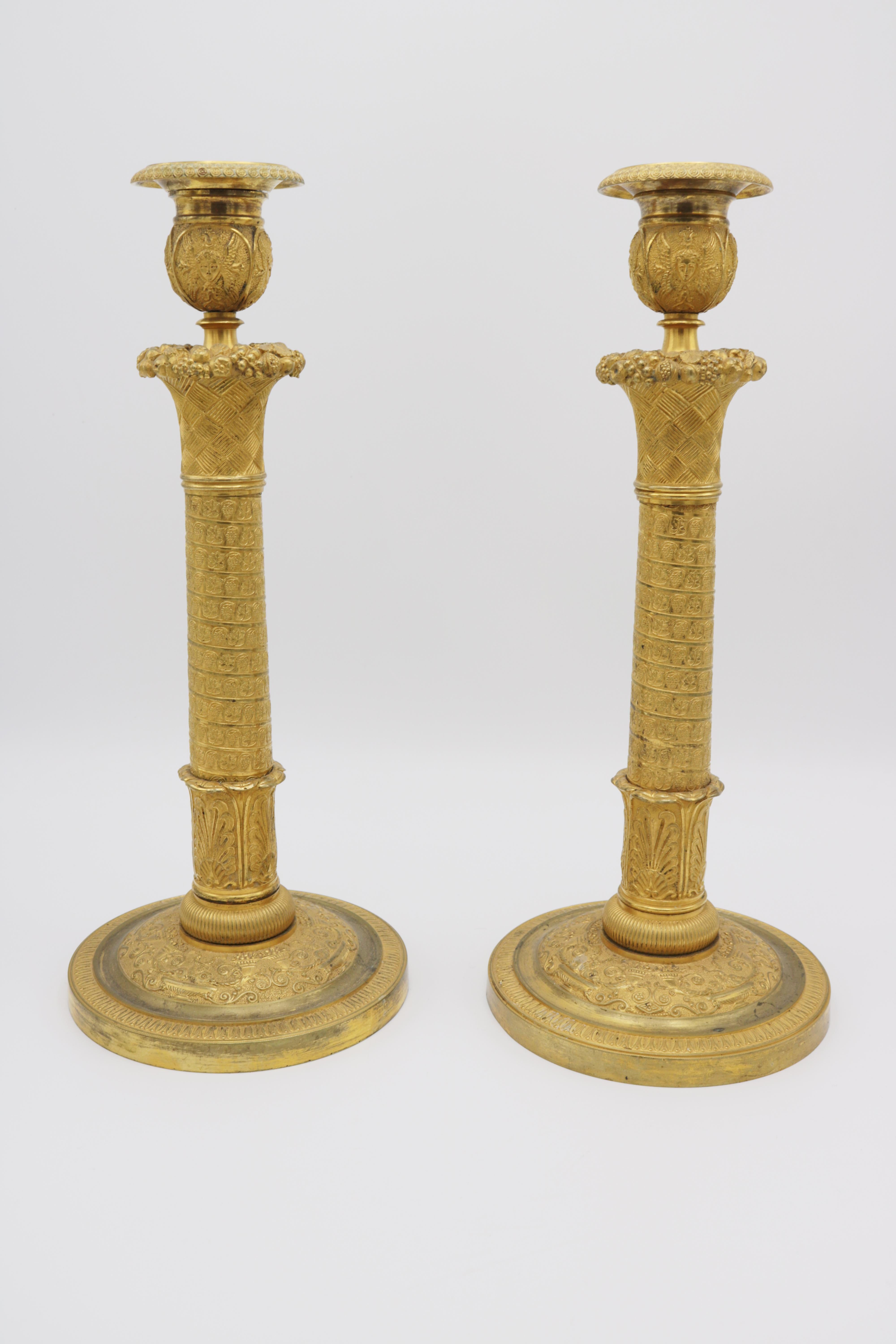 A fine pair of Empire ormolou candlesticks.