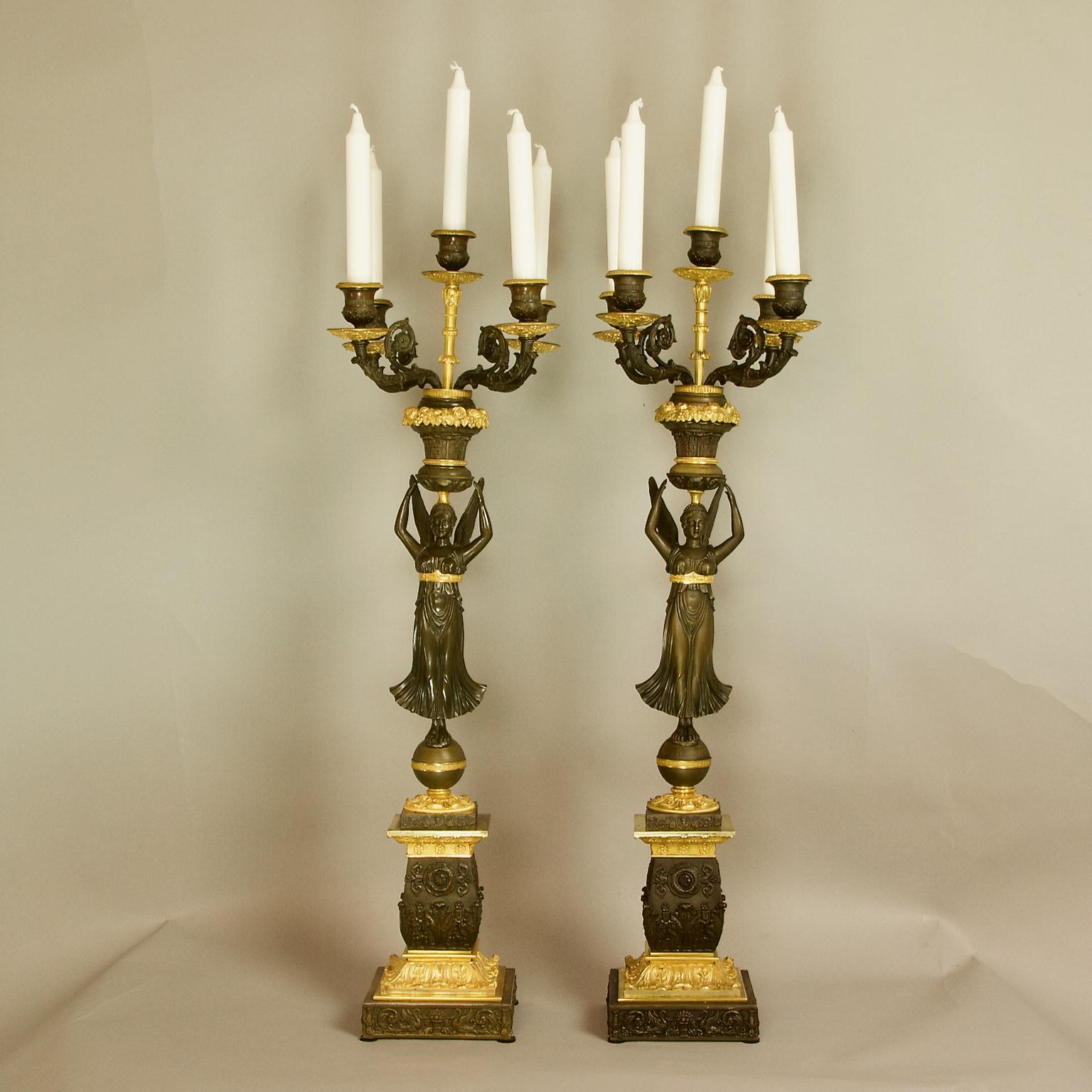 Pair of Large 19th Century Empire Ormolu and Patinated Bronze Victory Sculptures Candelabras in the manner of Philippe Thomire (1751-1843)

A large and important pair of ormolu and patinated bronze candelabras in the manner of Philippe Thomire