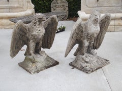 Pair of Large English Cast Stone Opposing Eagles, circa 1920s