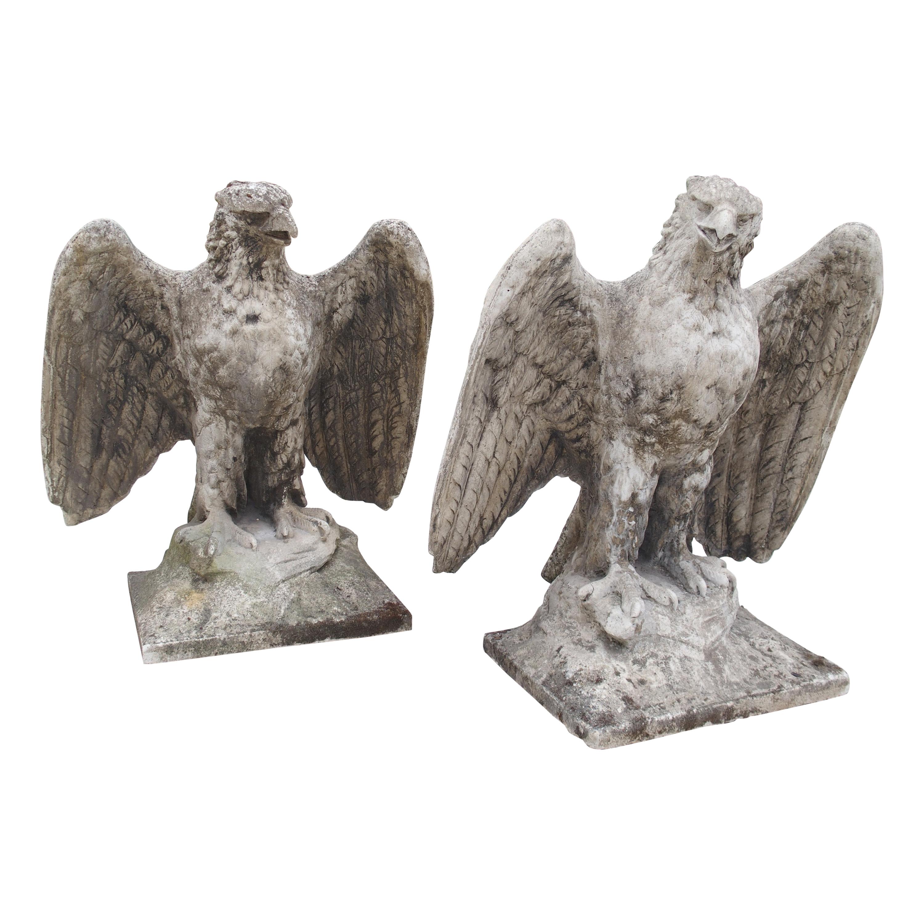 Pair of Large English Cast Stone Opposing Eagles, circa 1920s