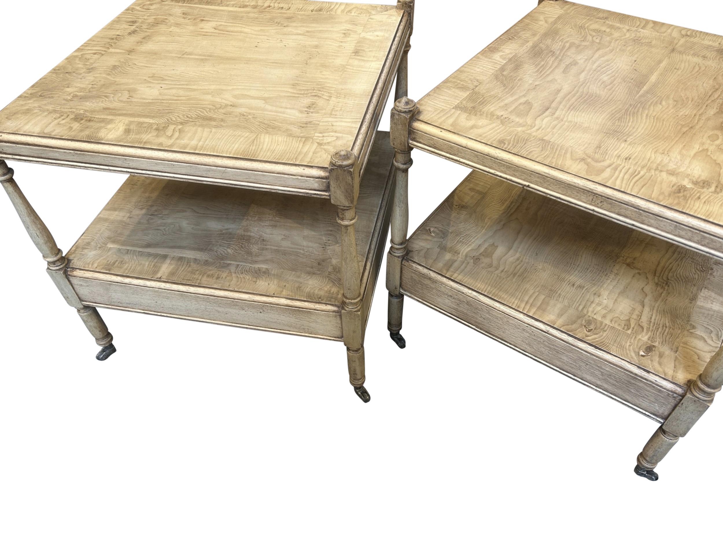 A pair of English, good scale two tier pickled yew wood etargere on brass castors.
