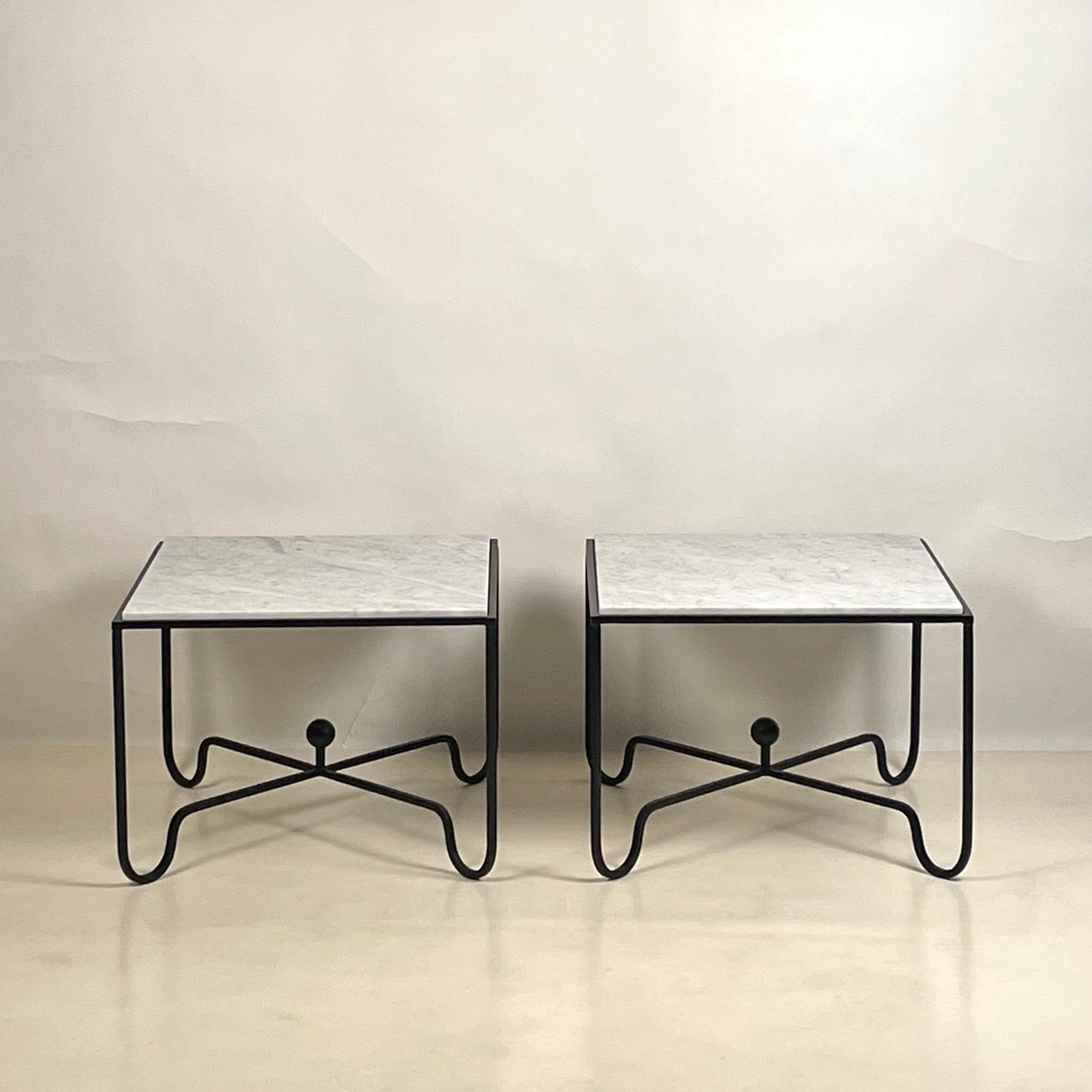 Pair of large 'Entretoise' Carrara marble side or end tables by Design Frères.

Chic and understated.

Also great as a two-part coffee table.