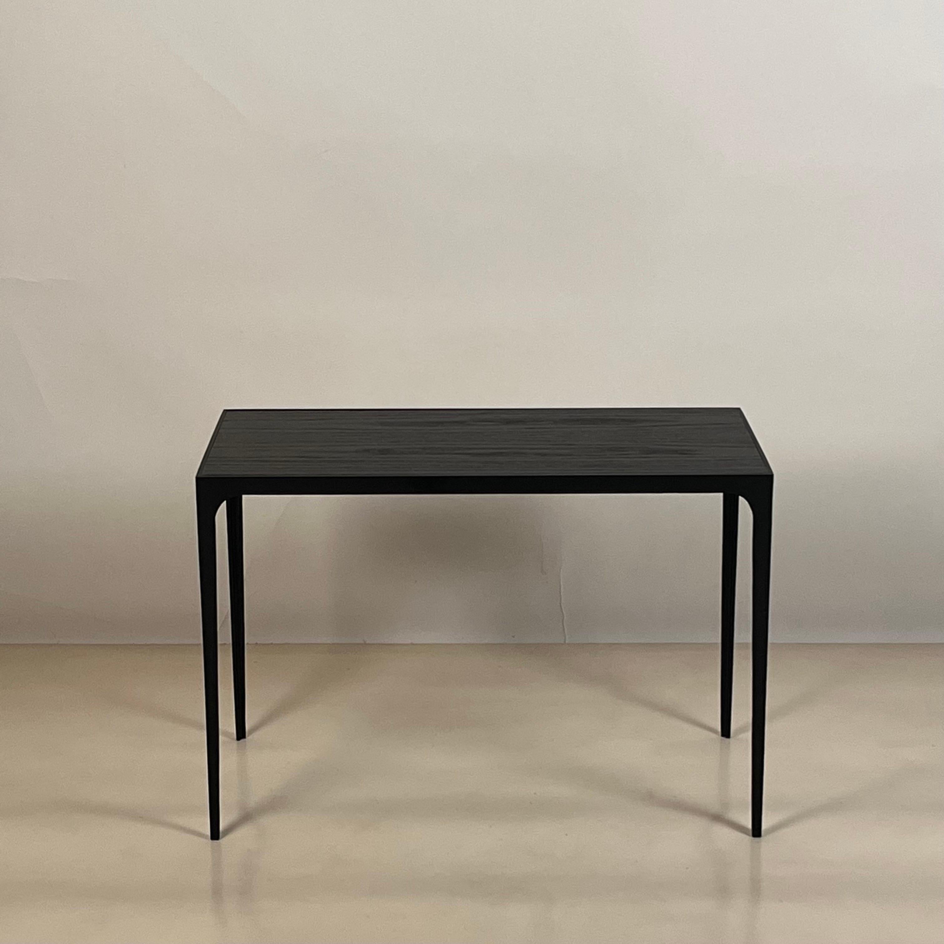 Pair for Large 'Esquisse' Ebonized Oak End Tables by Design Frères.

Slender, pared-down Art Deco style blackened steel frames fitted with ebonized oak tops.

Handmade in our Los Angeles atelier by our stilled artisans.

Chic and understated.